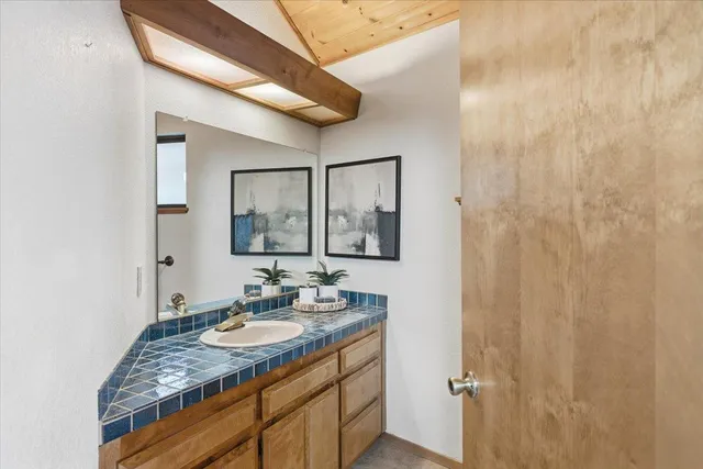 a view of a fence and trees around