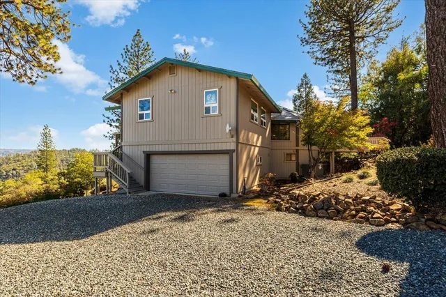 a view of a balcony with furniture and wooden floor