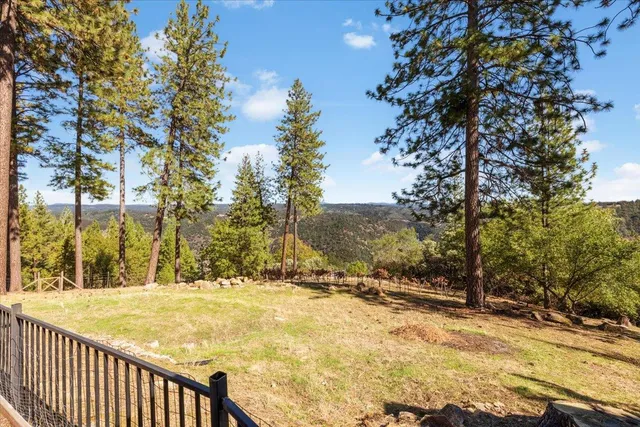 a living room with furniture and flat screen tv