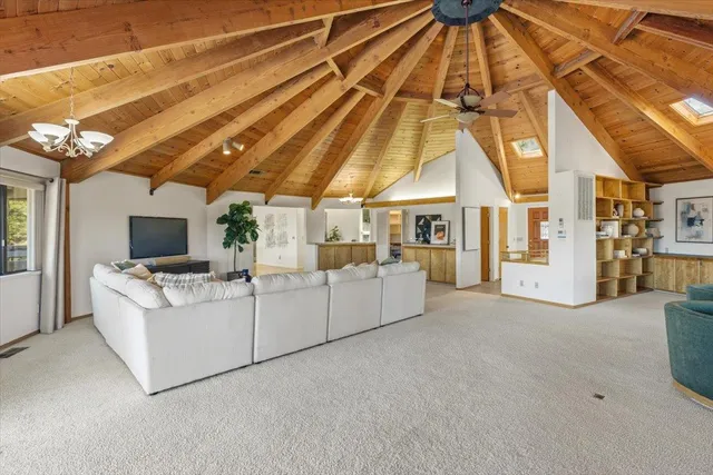 a view of lobby with couch and glass door