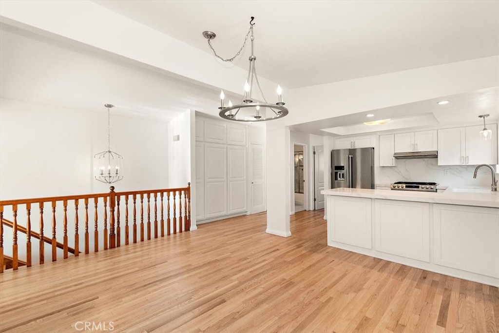 1742 Reed Street Redondo Beach, CA 90278 - Photo 14 of 33 a view of a kitchen with wooden floor and a sink