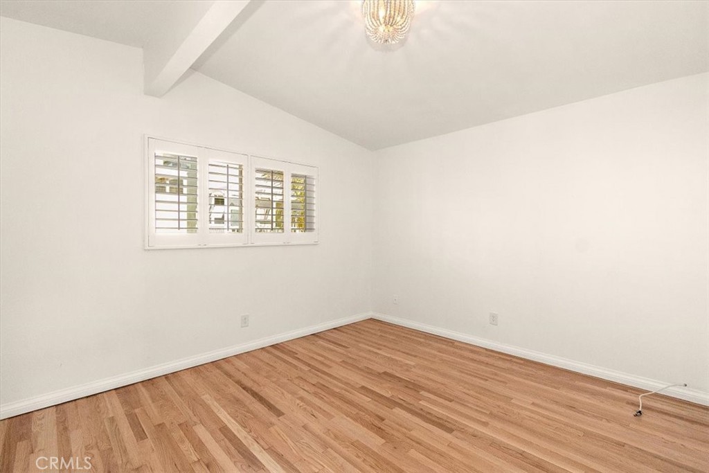 1742 Reed Street Redondo Beach, CA 90278 - Photo 27 of 33 an empty room with wooden floor and windows