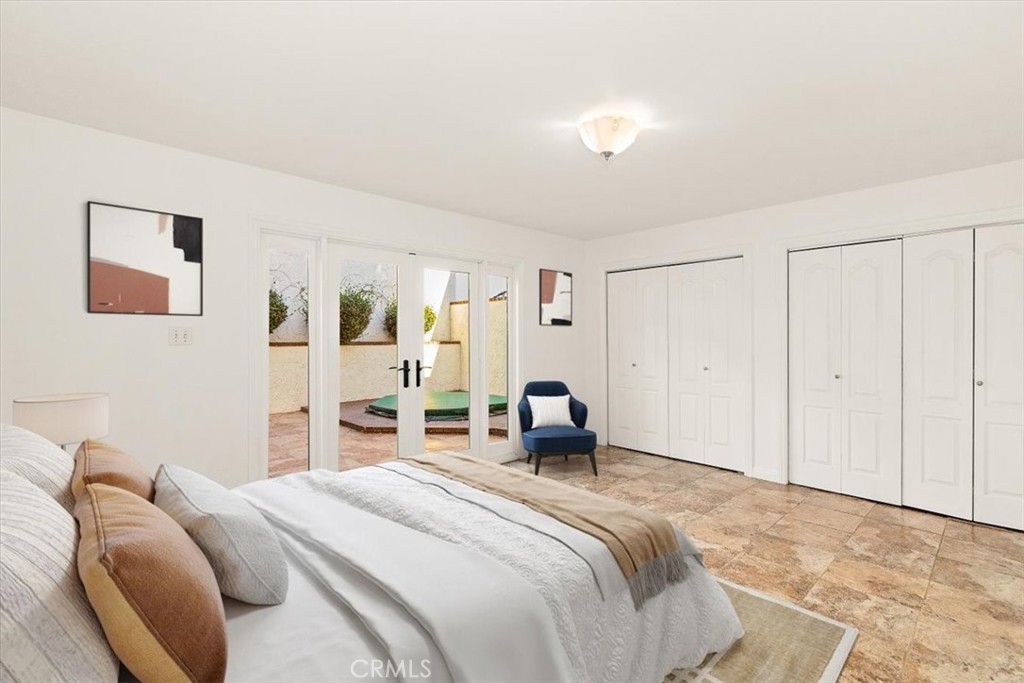 1742 Reed Street Redondo Beach, CA 90278 - Photo 4 of 33 a bedroom with a bed and a couch