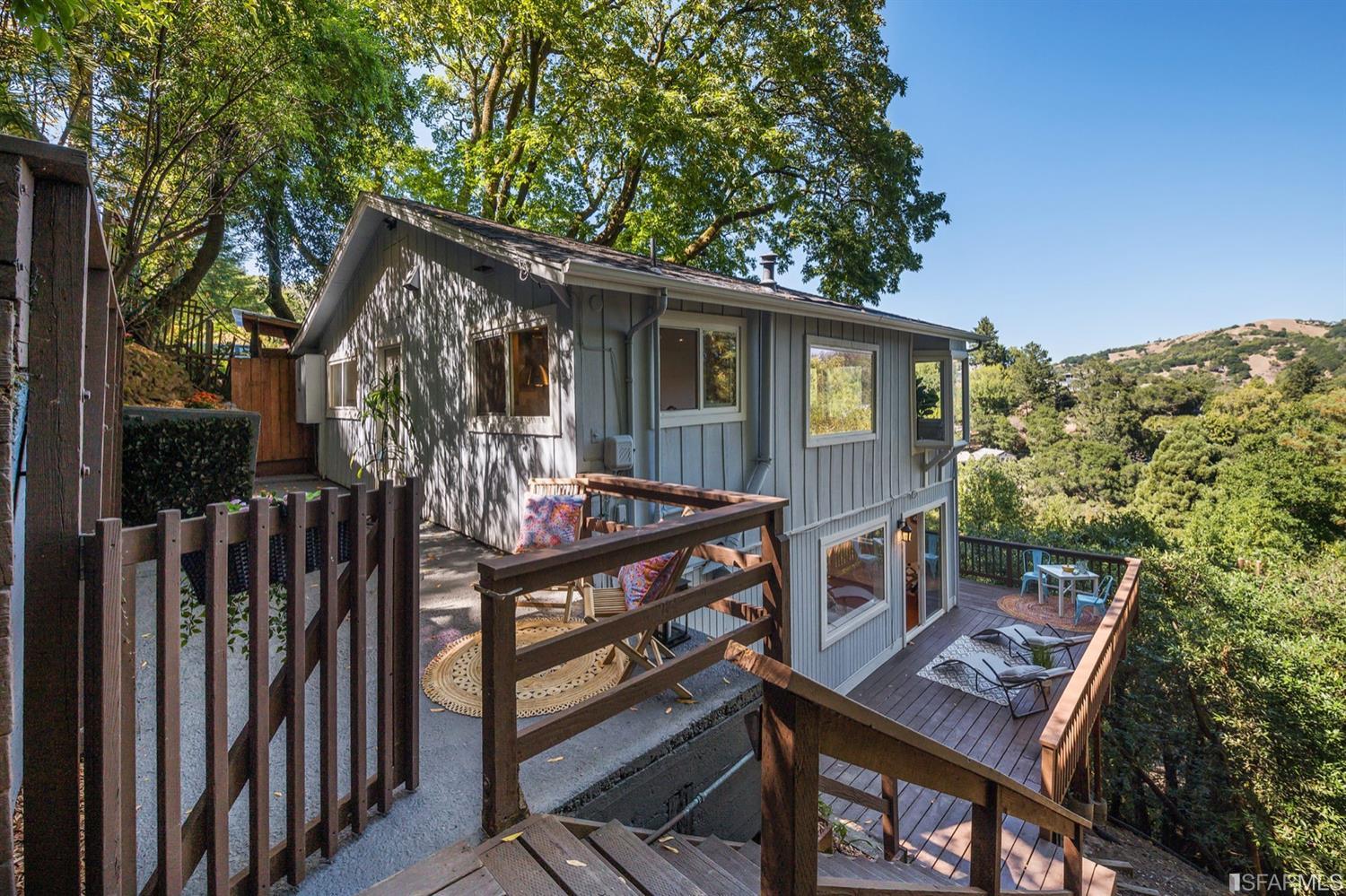 223 Scenic Road Fairfax, CA 94930 - Photo 1 of 1 a view of a house with wooden deck front of house