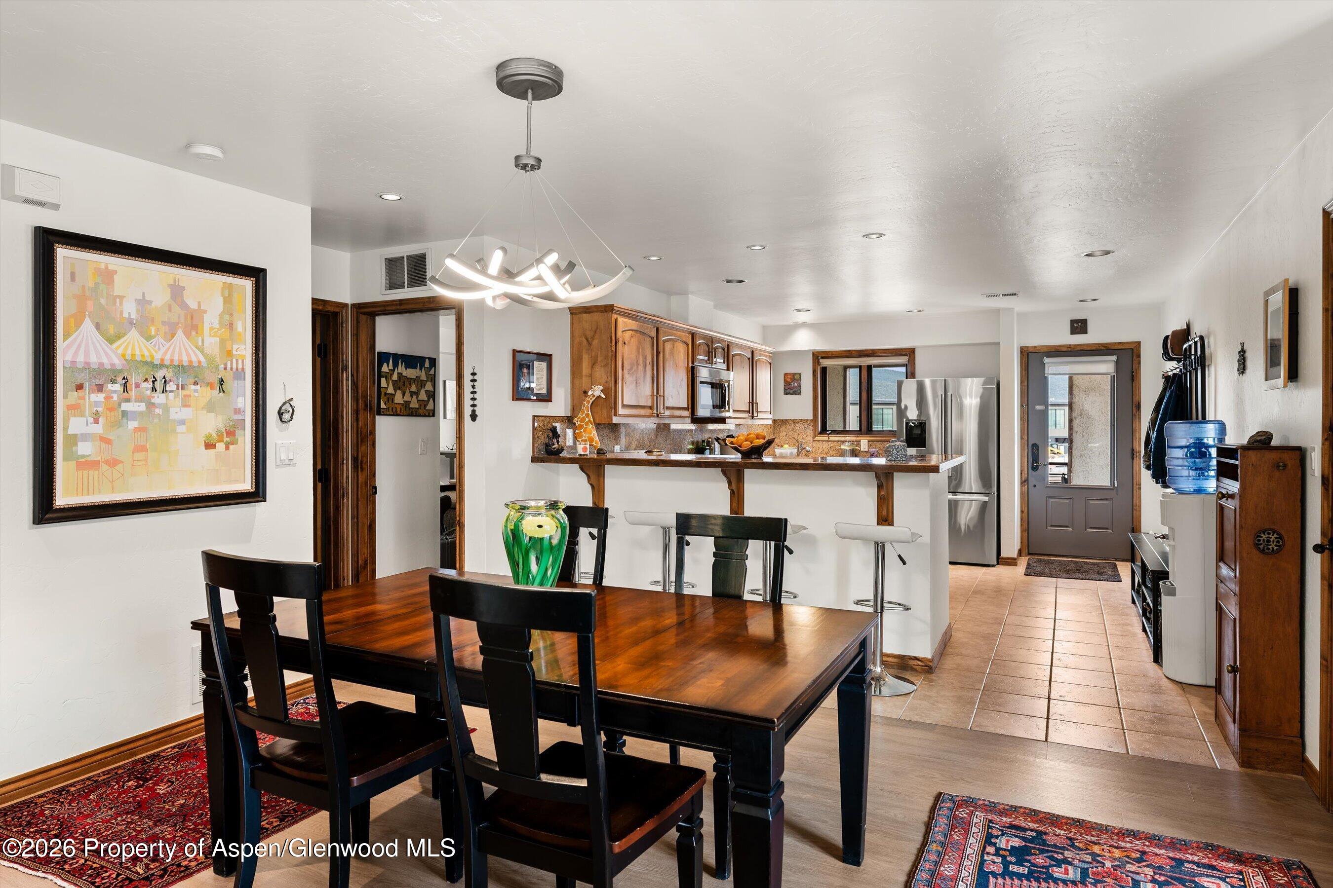 1460 Main Street Carbondale, CO 81623 - Photo 6 of 19 1460MainSt_dining area toward kitchen an