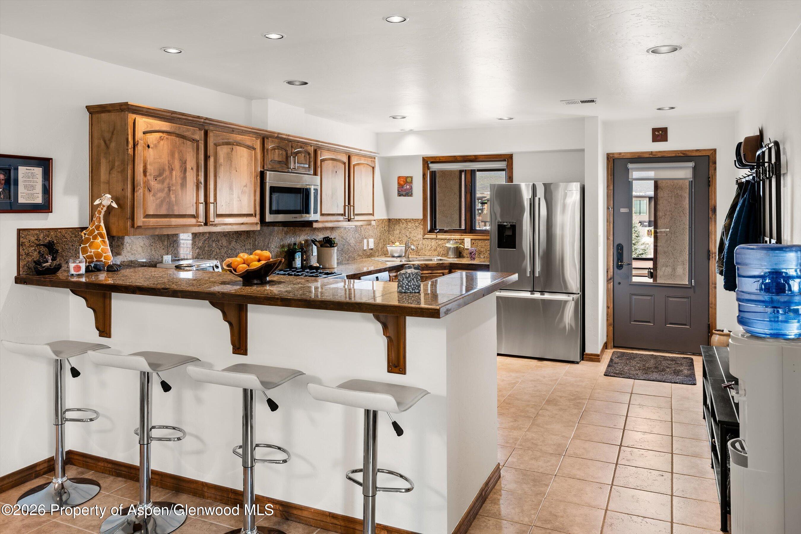 1460 Main Street Carbondale, CO 81623 - Photo 7 of 19 1460MainSt_kitchen toward front door