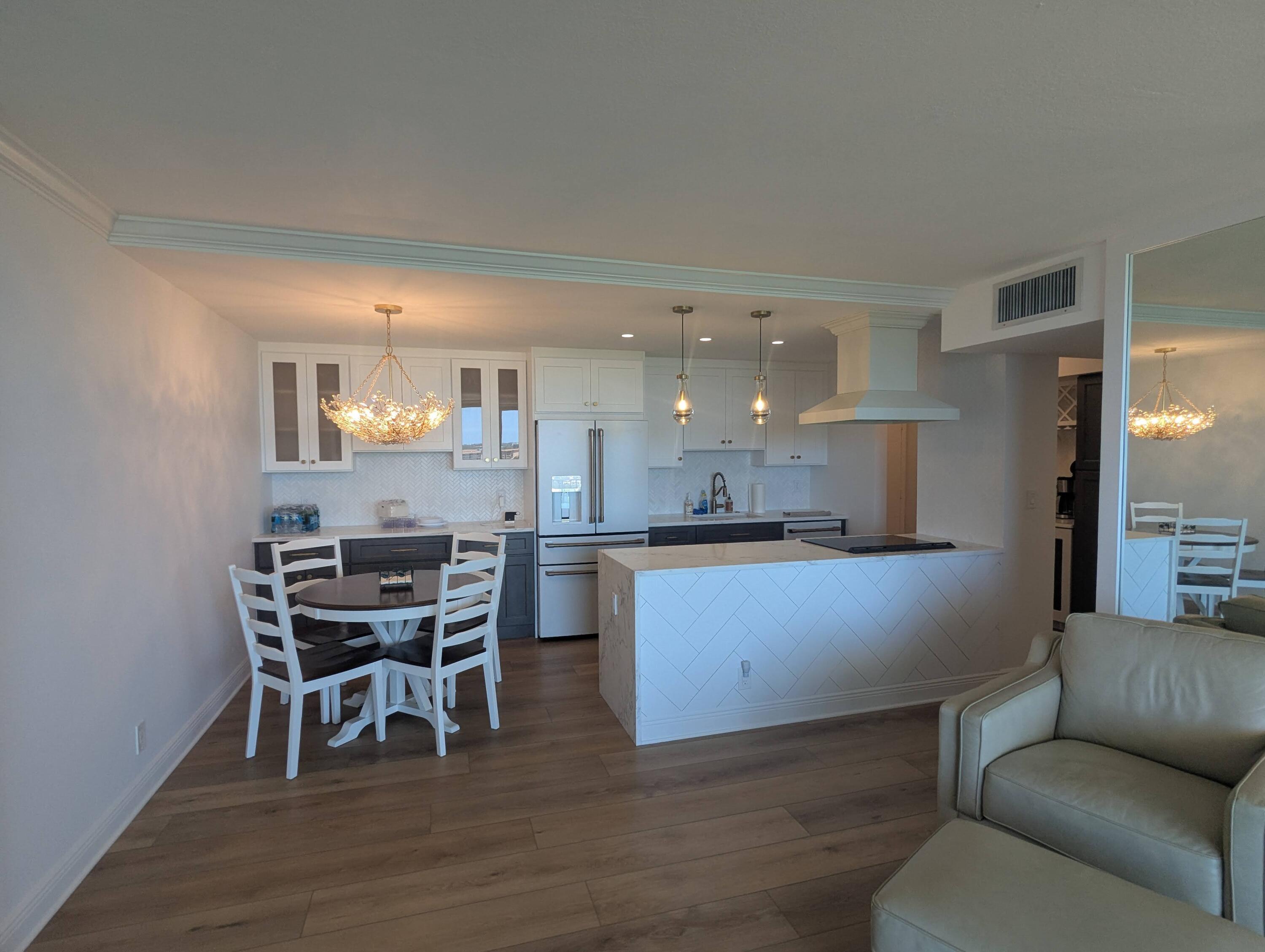 2121 North Ocean Boulevard, Unit 1006E Boca Raton, FL 33431 - Photo 30 of 64 Kitchen and Dining room from Living room