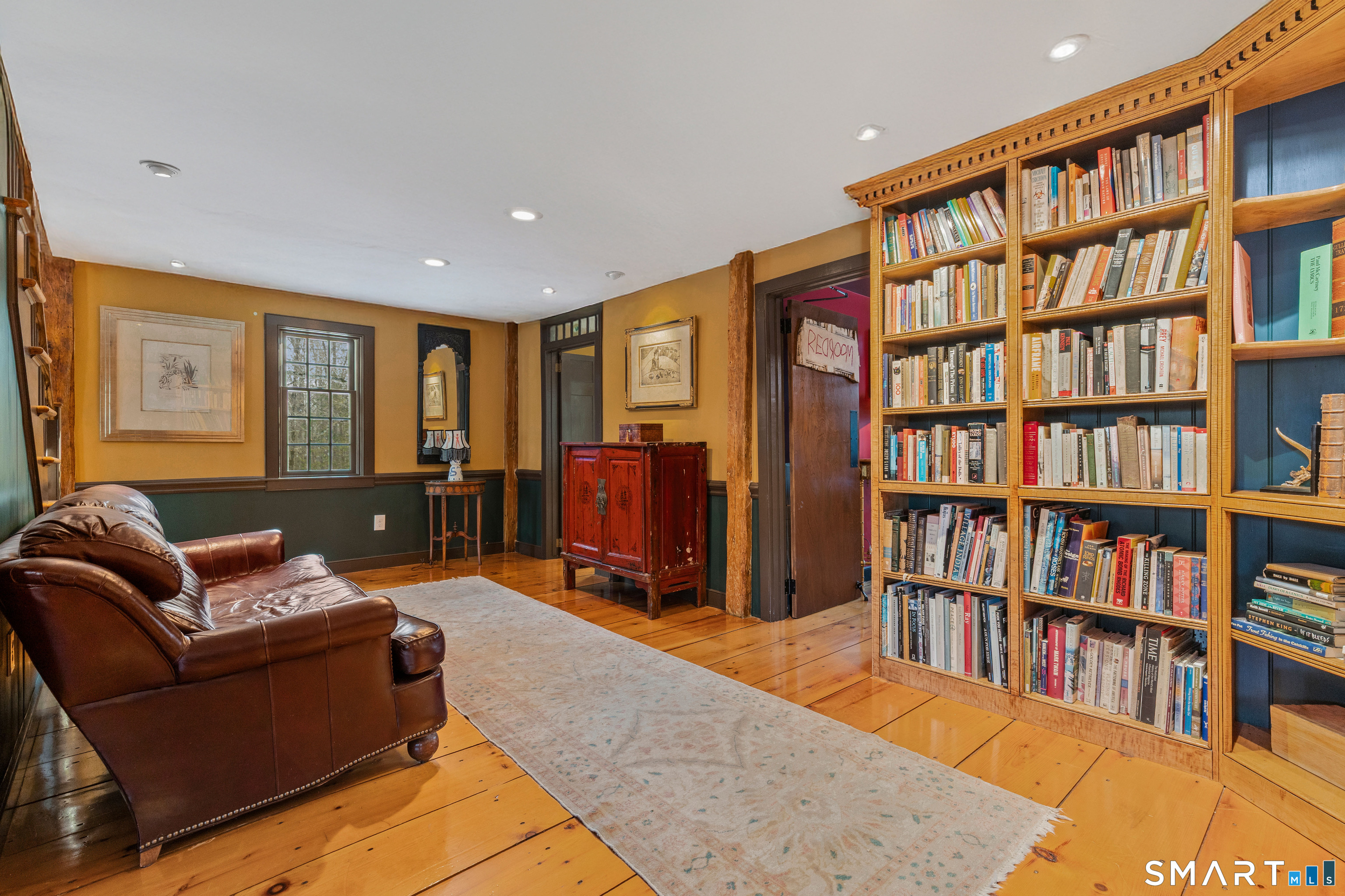 12 Jackson Road Killingworth, CT 06419 - Photo 13 of 40 The library is a perfect sitting area or could double as a dining room.