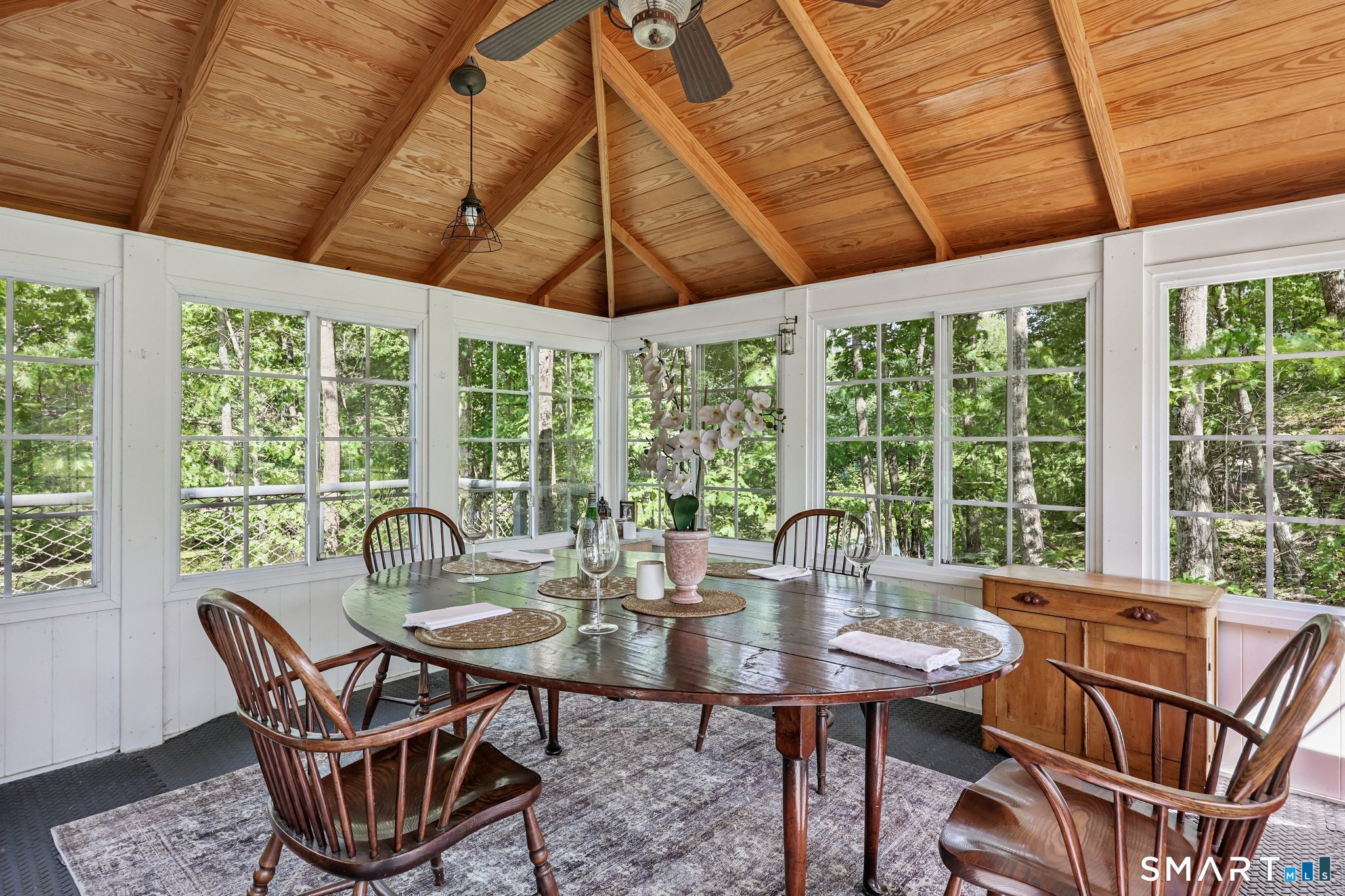 12 Jackson Road Killingworth, CT 06419 - Photo 35 of 40 Perched over the largest pond on the property, the pond house offers a serene escape from the everyday life. You are surrounded by nature in a serene retreat environment.