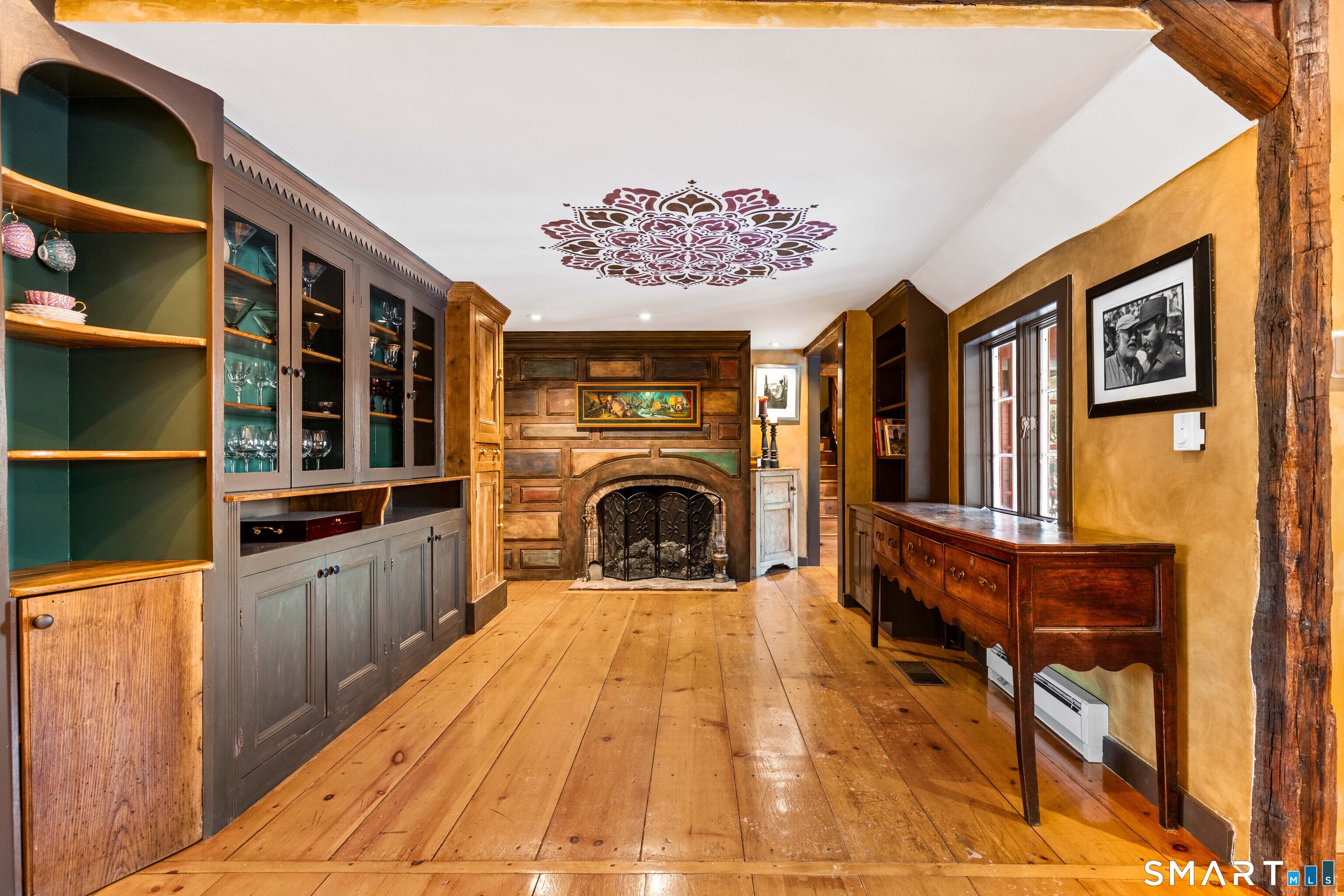 12 Jackson Road Killingworth, CT 06419 - Photo 6 of 40 Gorgeous built ins including one brought over from Ireland highlight this exceptional entry. Notice one of four fireplaces.