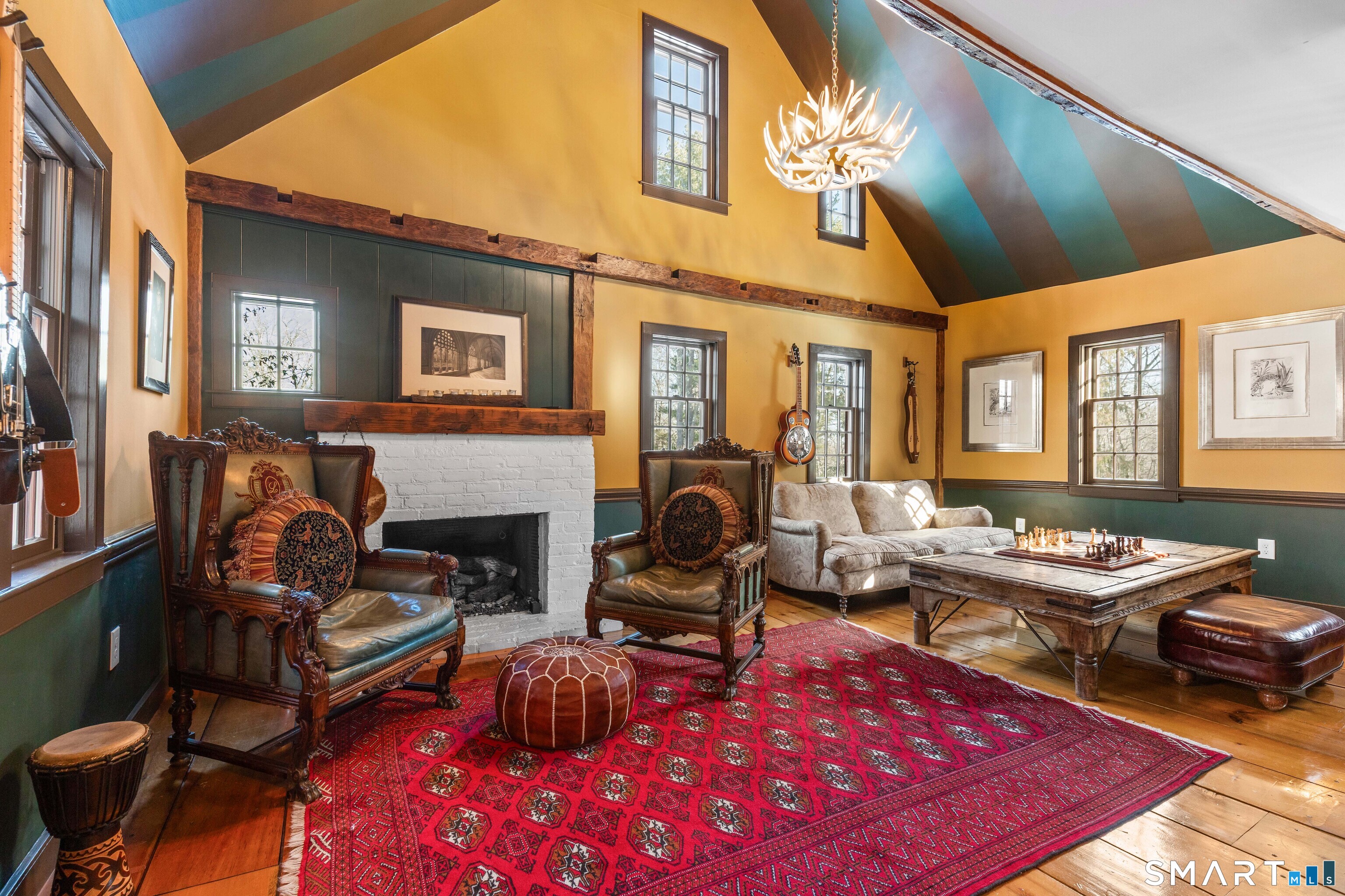 12 Jackson Road Killingworth, CT 06419 - Photo 10 of 40 Featuring wide plank white pine floors which are throughout this entire home, as well as beautifully accented antique square head nails and authentic detail.