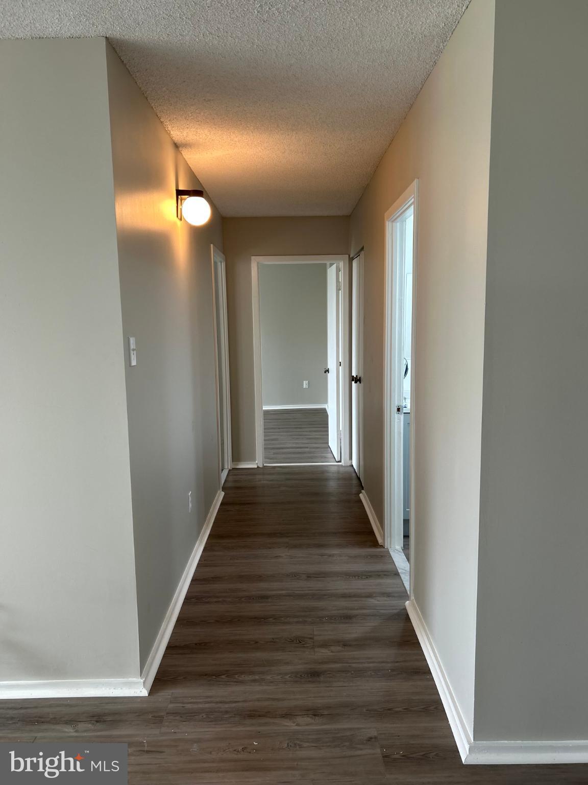 4100 North Charles Street, Unit 507 Baltimore, MD 21218 - Photo 14 of 20 Bright and inviting hallway with modern charm.
