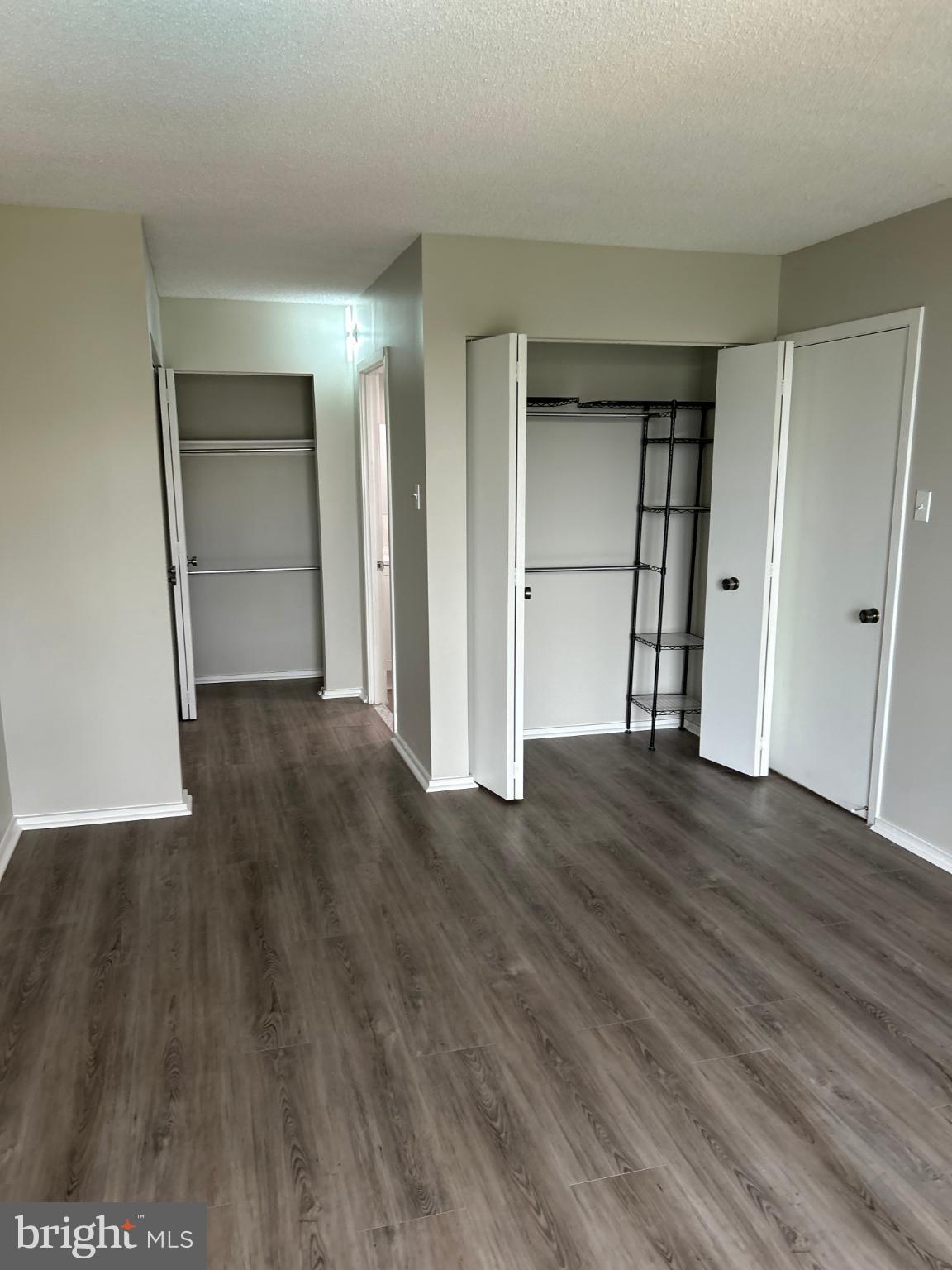 4100 North Charles Street, Unit 507 Baltimore, MD 21218 - Photo 20 of 20 Spacious, modern living area with closets.