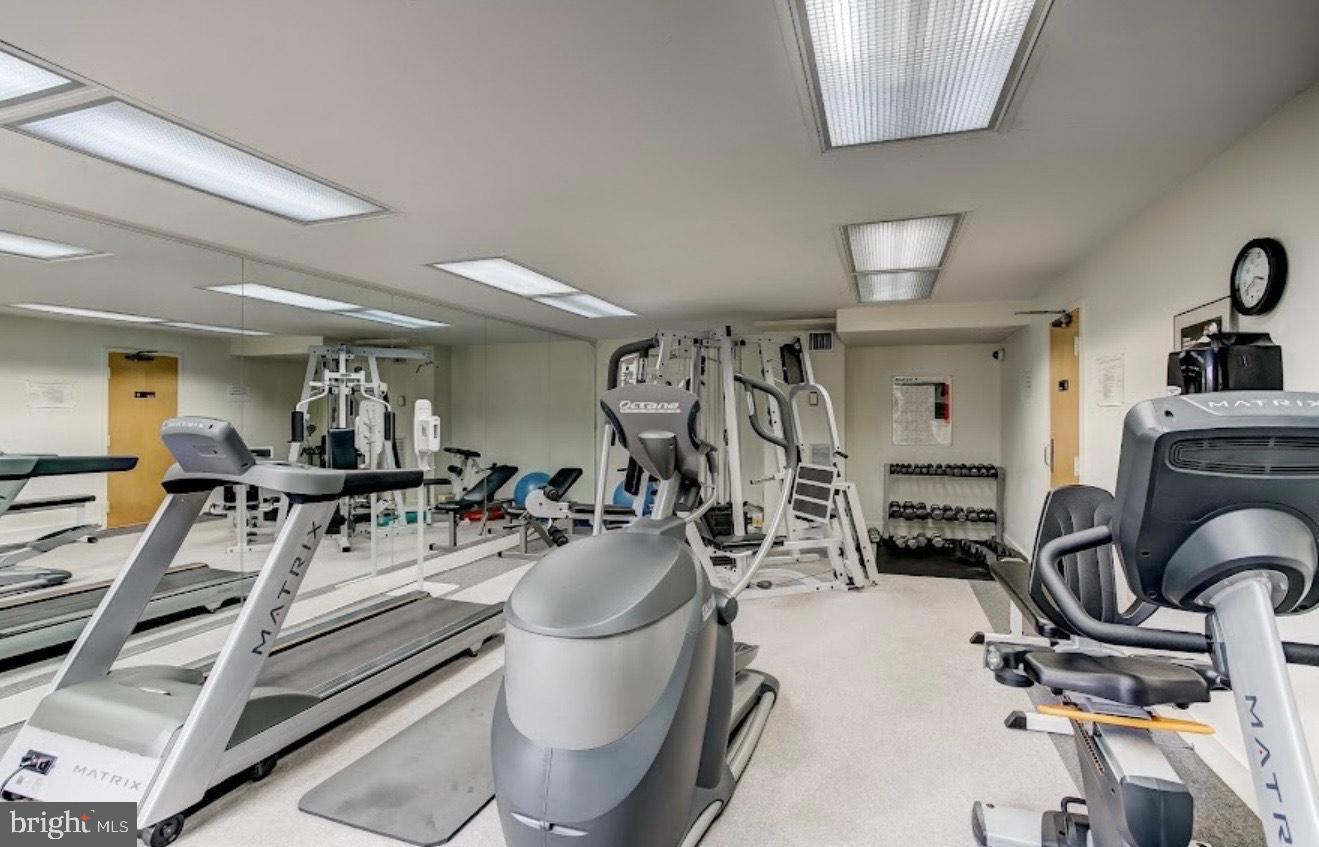 4100 North Charles Street, Unit 507 Baltimore, MD 21218 - Photo 3 of 20 Modern fitness space with ample equipment.