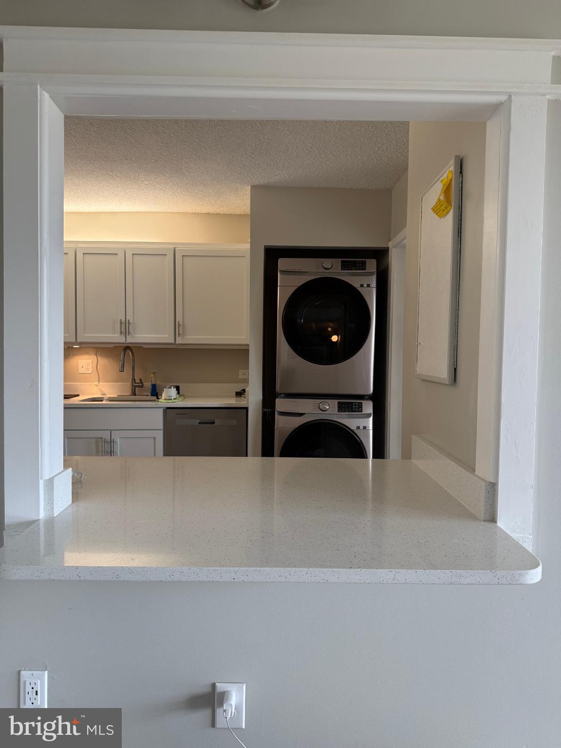 4100 North Charles Street, Unit 507 Baltimore, MD 21218 - Photo 7 of 20 Modern kitchen with laundry nook view.