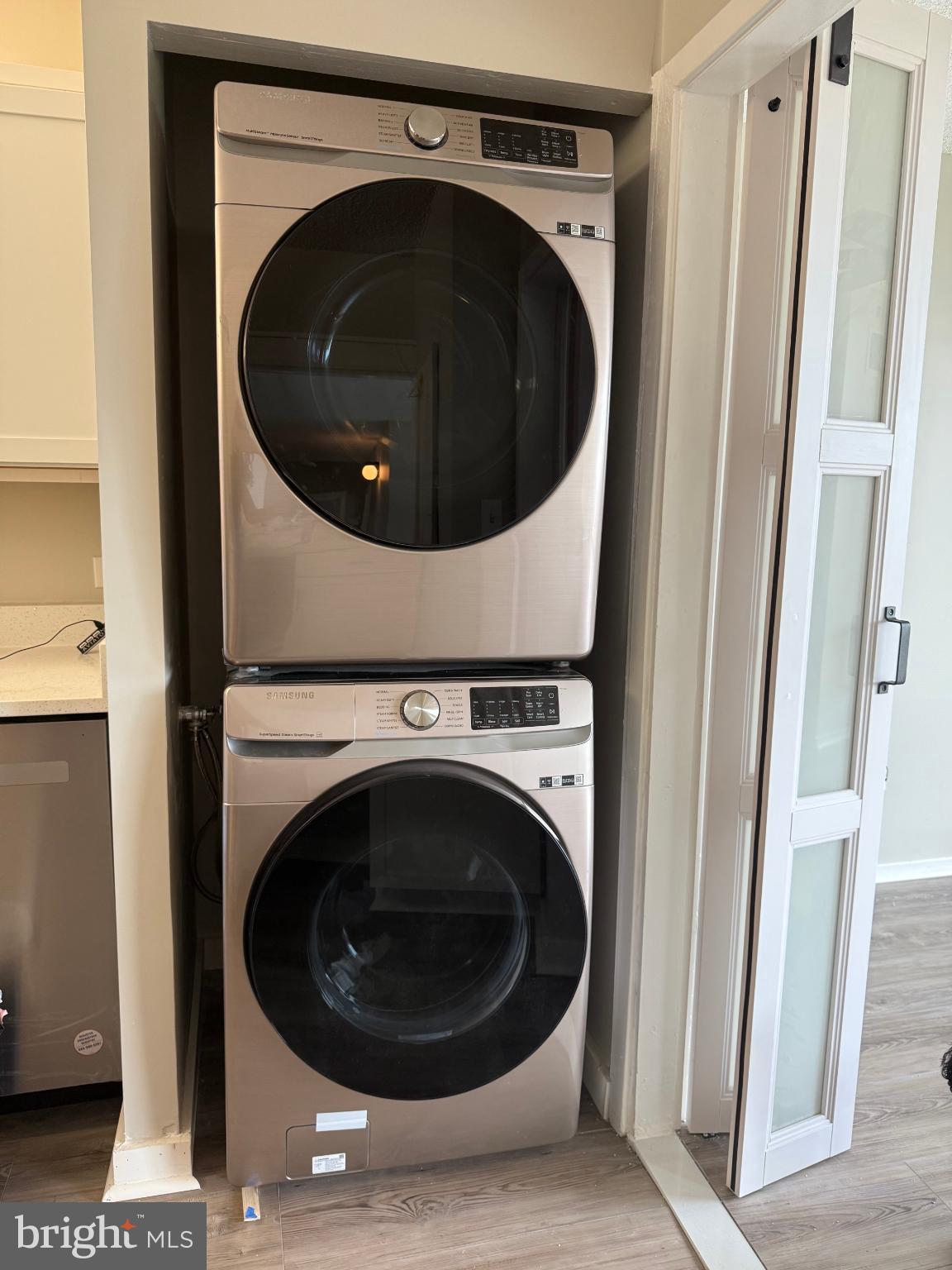 4100 North Charles Street, Unit 507 Baltimore, MD 21218 - Photo 8 of 20 Sleek stacked washer and dryer unit.