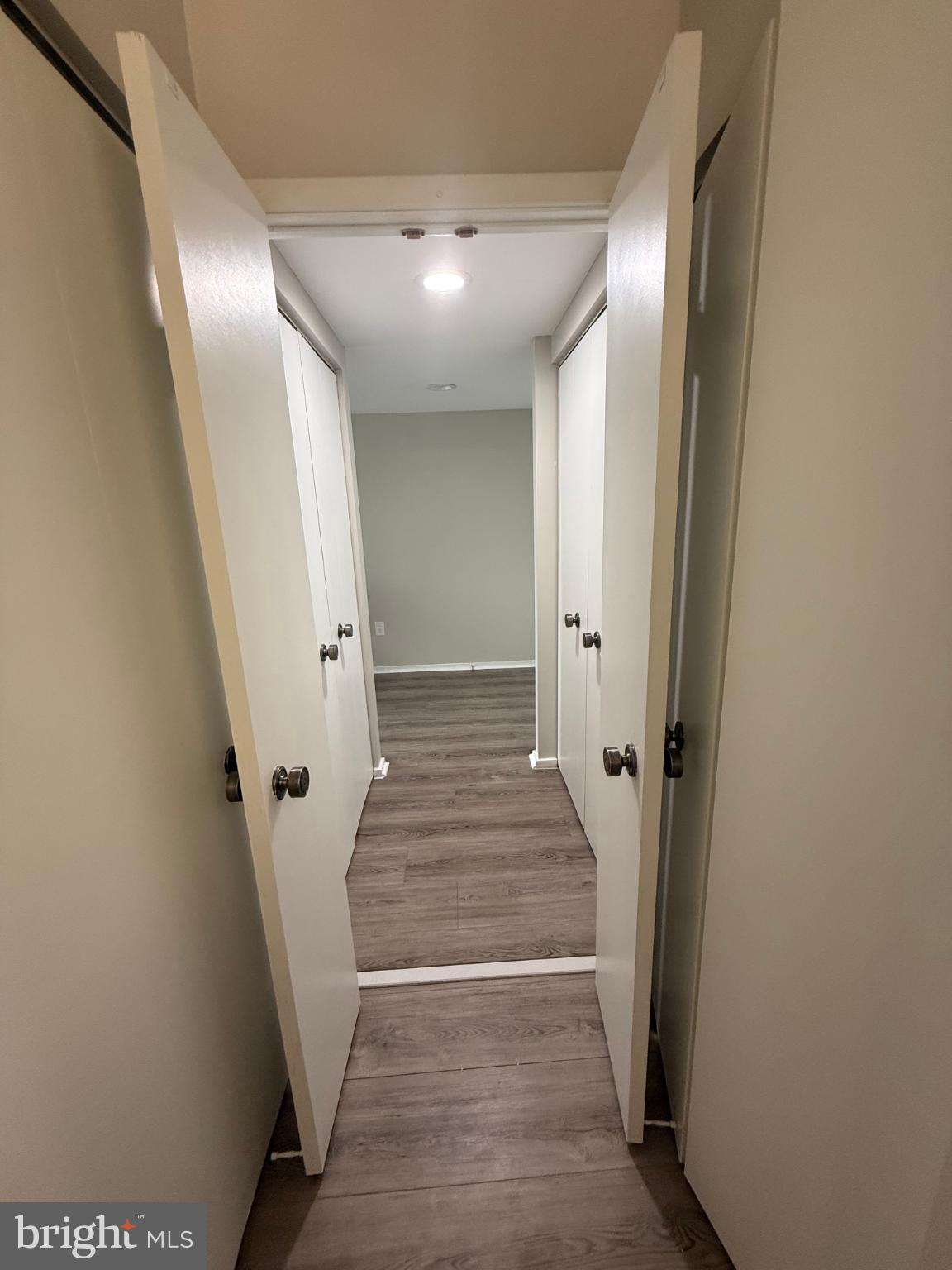 4100 North Charles Street, Unit 507 Baltimore, MD 21218 - Photo 10 of 20 Inviting hallway with double doors ahead.