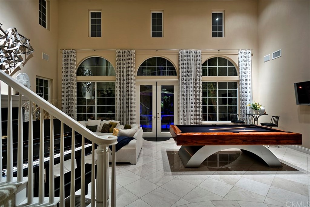 28362 Via Pasito San Juan Capistrano, CA 92675 - Photo 22 of 69 Great room French doors open up to the back yard resort