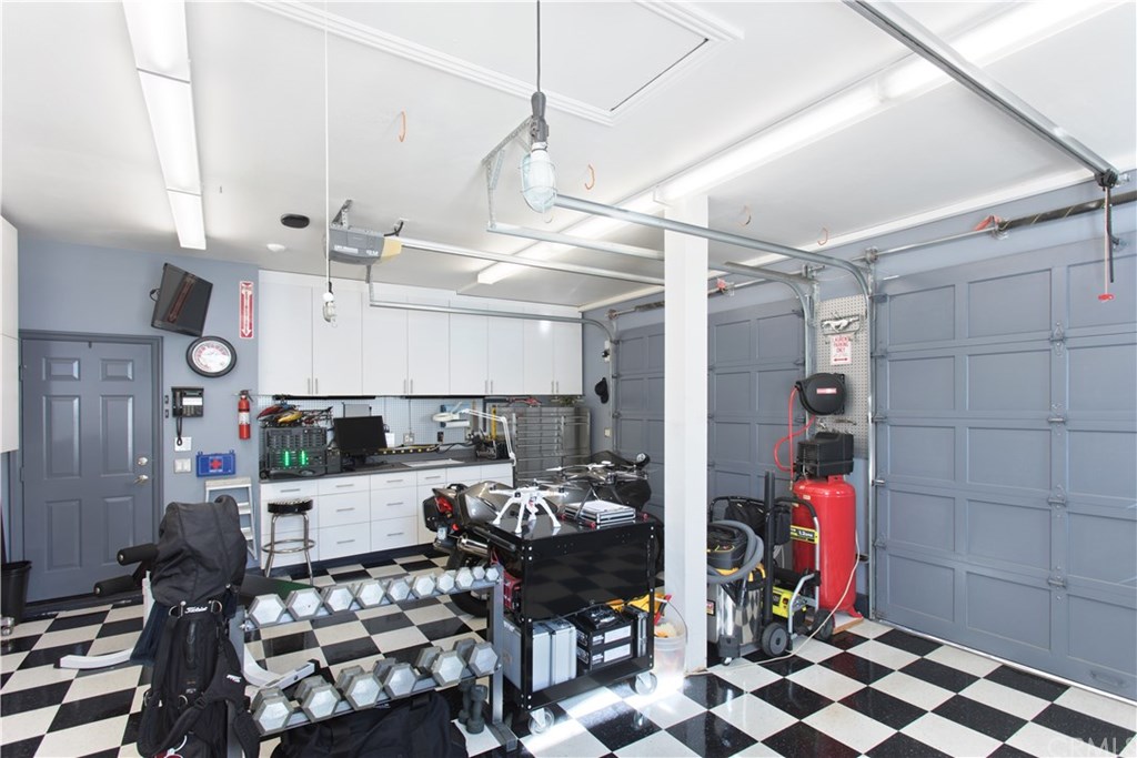 28362 Via Pasito San Juan Capistrano, CA 92675 - Photo 56 of 69 Garage 3 and 4, notice the work space and door to inner courtyard