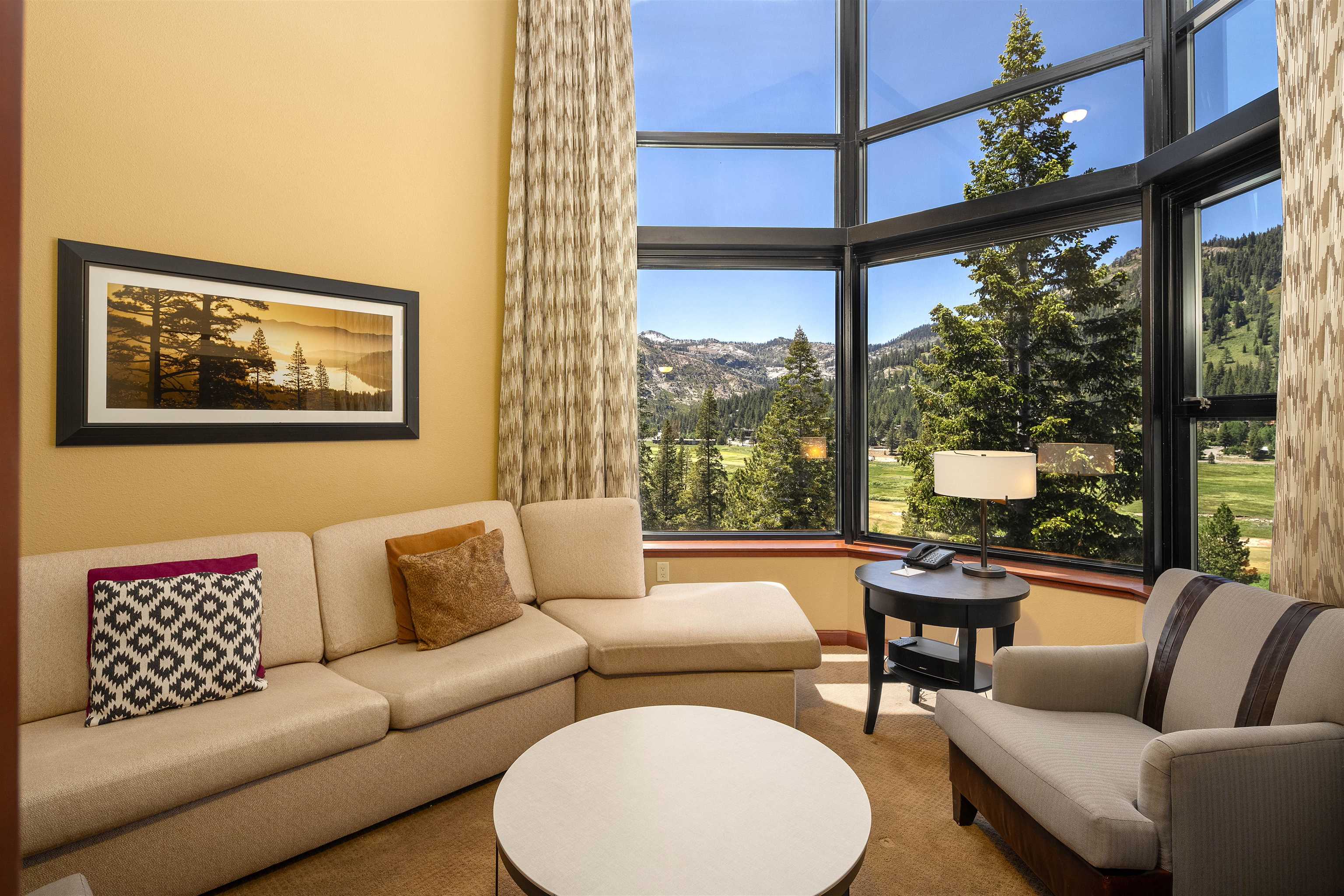400 Resort Road, Unit 838 840 Olympic Valley, CA 96146 - Photo 2 of 21 a living room with furniture and a large window