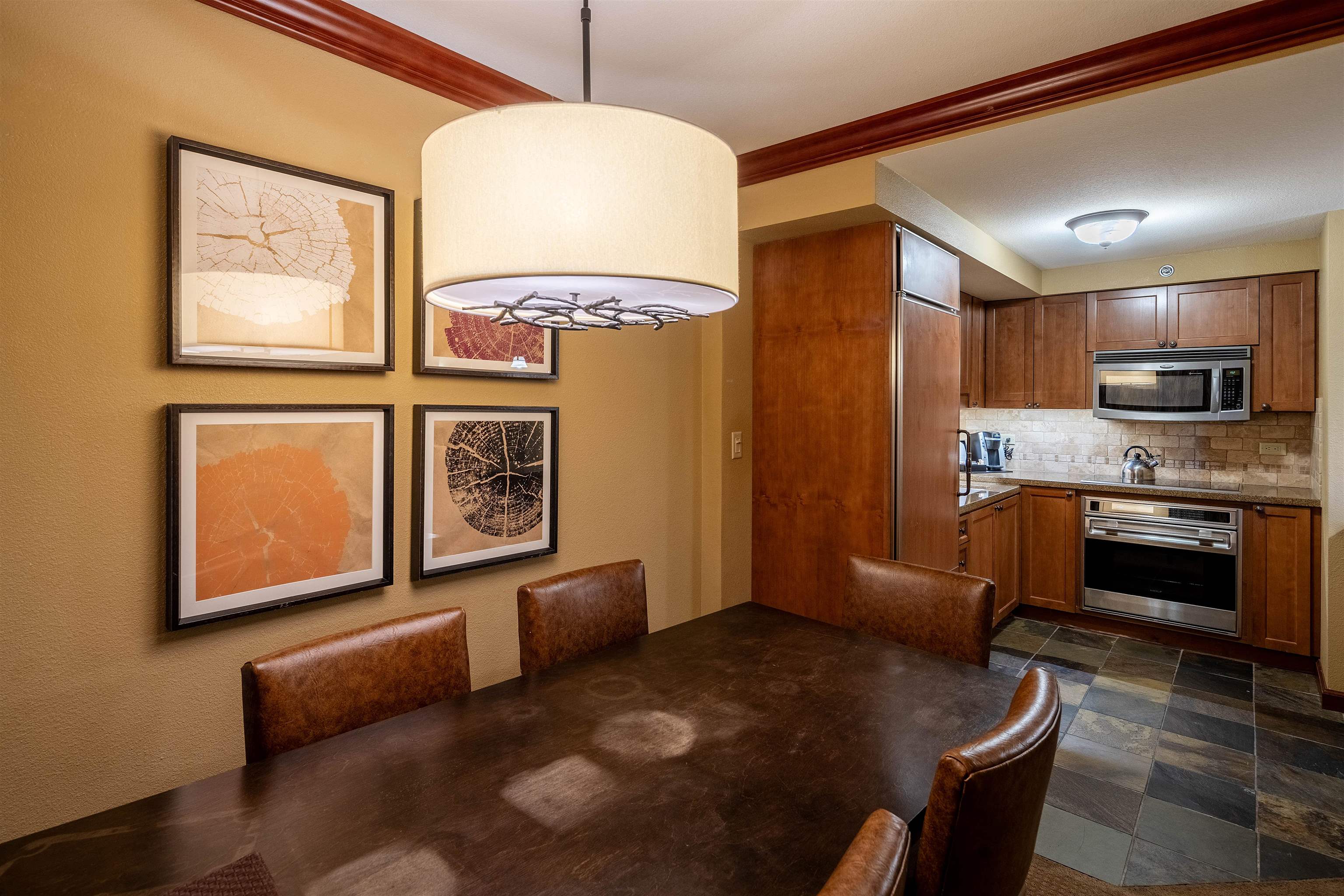 400 Resort Road, Unit 838 840 Olympic Valley, CA 96146 - Photo 8 of 21 a kitchen with stainless steel appliances granite countertop a refrigerator a stove top oven a sink and dishwasher