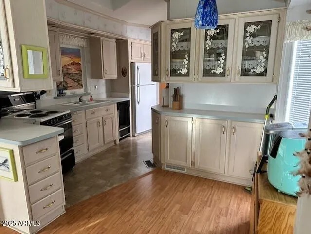 a spacious bathroom with a granite countertop sink and a mirror