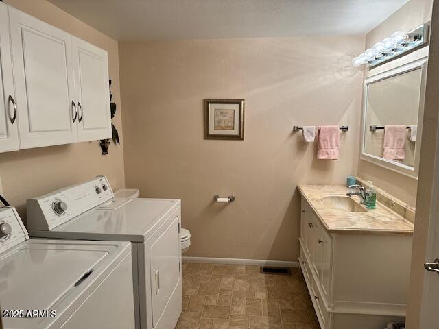 1444 South Zuni Drive Apache Junction, AZ 85119 - Photo 7 of 10 a utility room with dryer and washer