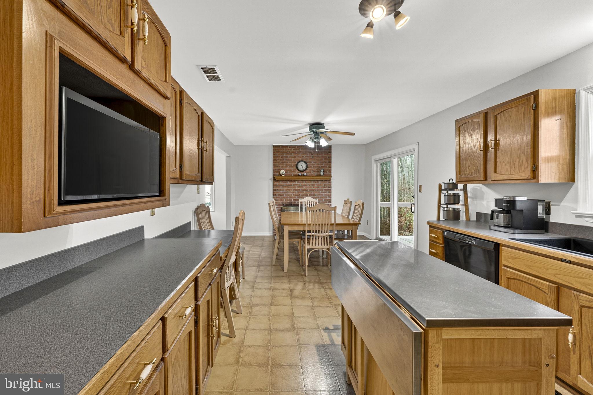 2266 Beaver Dam Road Midland, VA 22728 - Photo 35 of 93 a open kitchen with stainless steel appliances granite countertop a granite counter tops and a stove