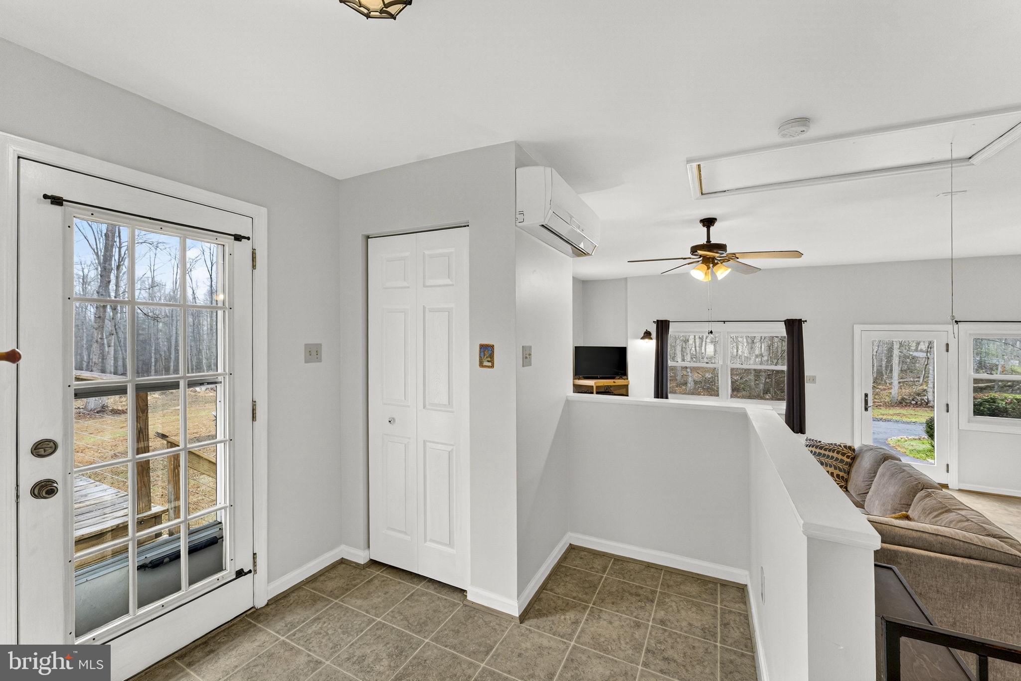 2266 Beaver Dam Road Midland, VA 22728 - Photo 41 of 93 a living room with furniture and a flat screen tv