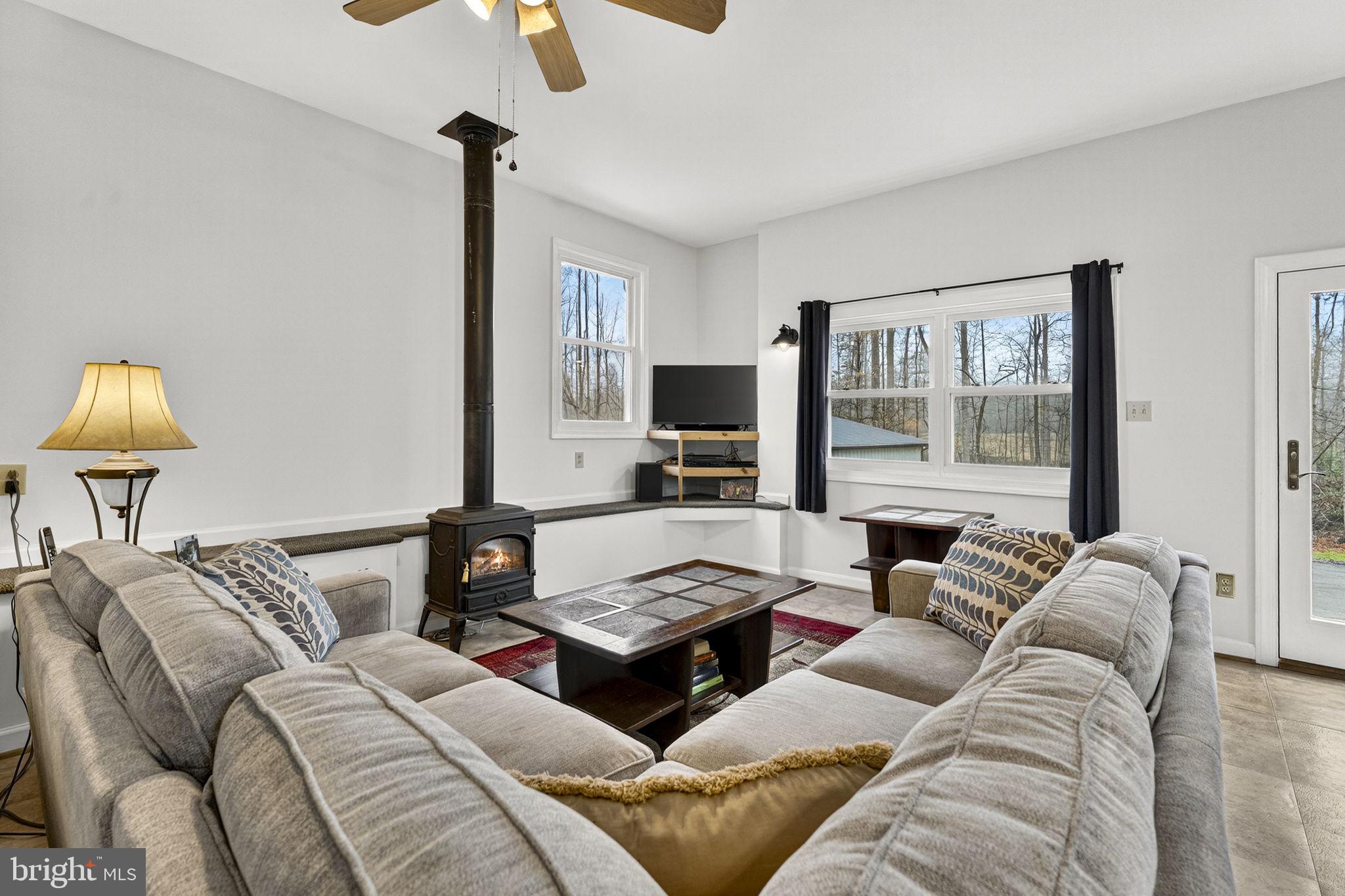 2266 Beaver Dam Road Midland, VA 22728 - Photo 43 of 93 a living room with furniture and a window