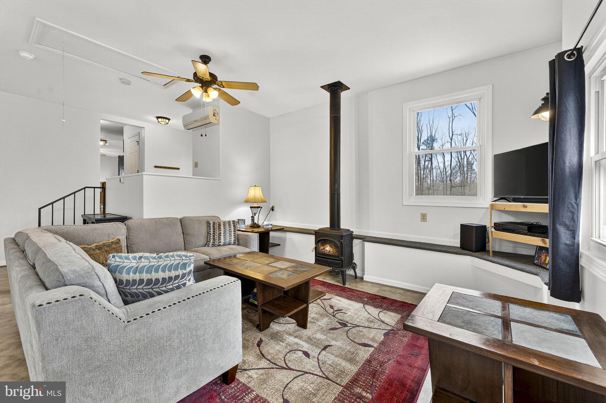 2266 Beaver Dam Road Midland, VA 22728 - Photo 45 of 93 a living room with furniture and a flat screen tv