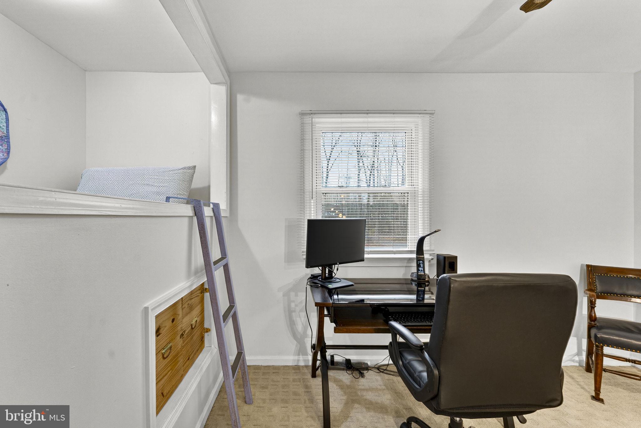2266 Beaver Dam Road Midland, VA 22728 - Photo 58 of 93 a view of a workspace with furniture and a window