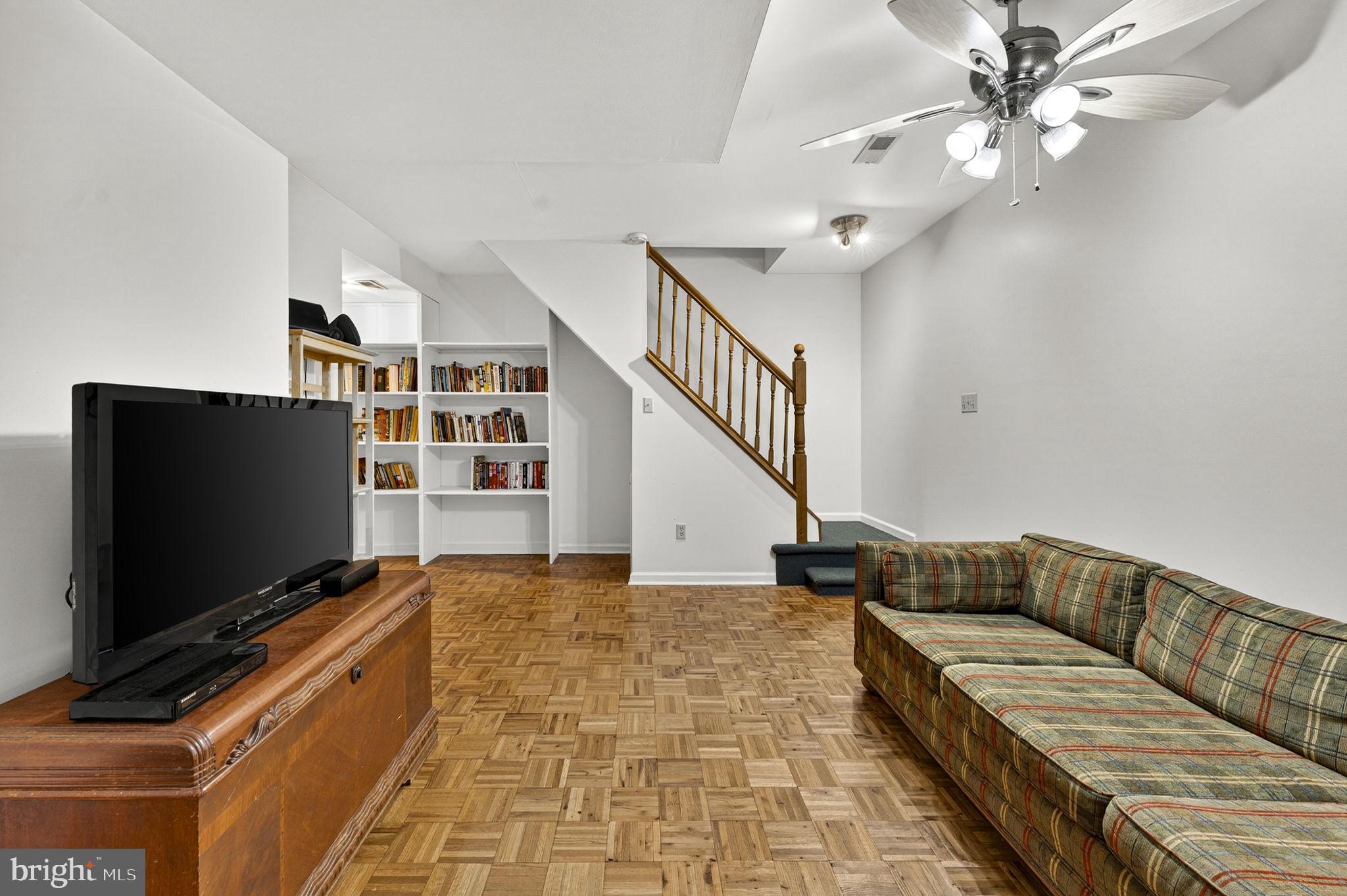 2266 Beaver Dam Road Midland, VA 22728 - Photo 74 of 93 a living room with couches and a flat screen tv