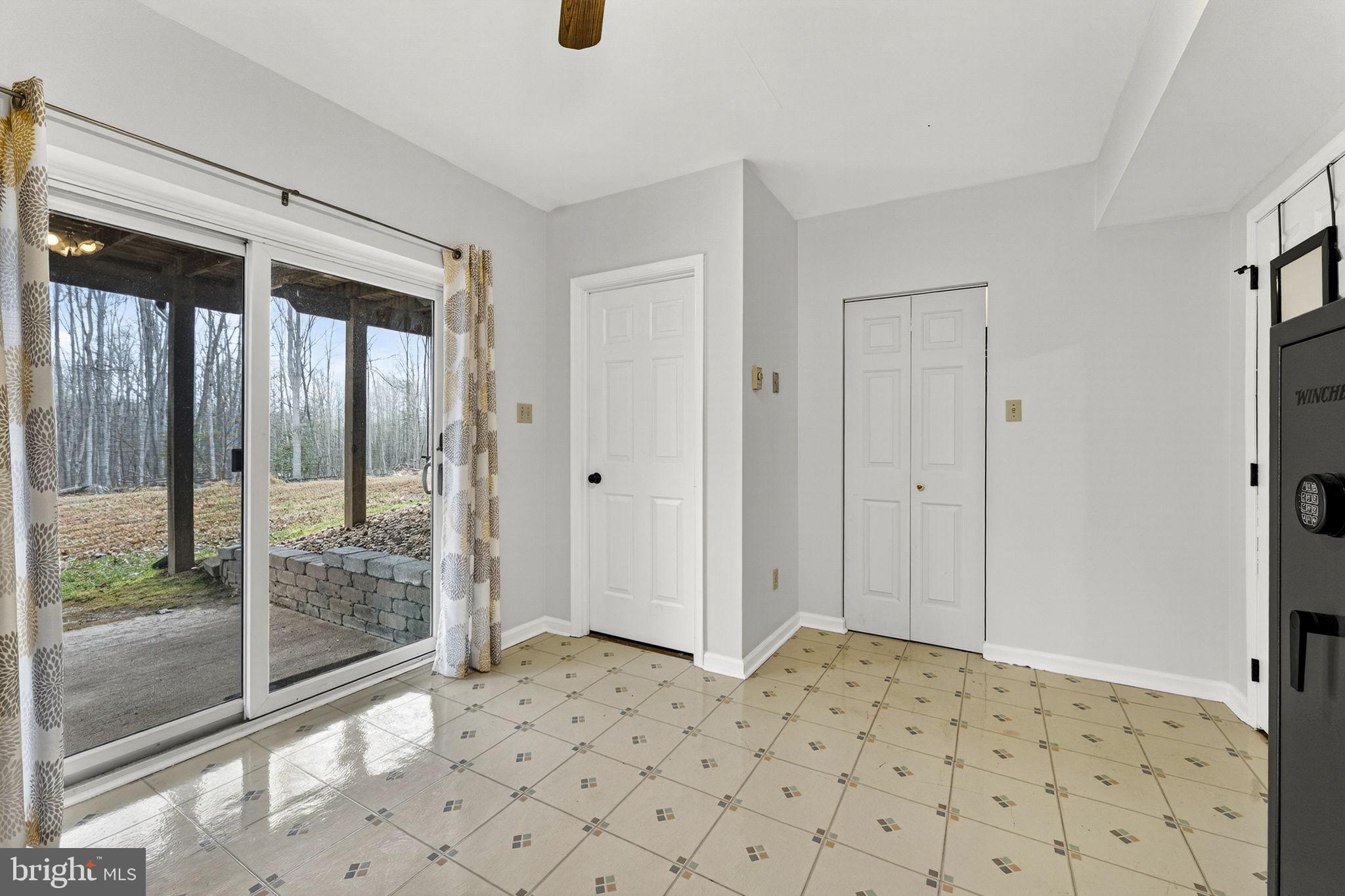 2266 Beaver Dam Road Midland, VA 22728 - Photo 75 of 93 Lower level den w/sliding doors to lower patio