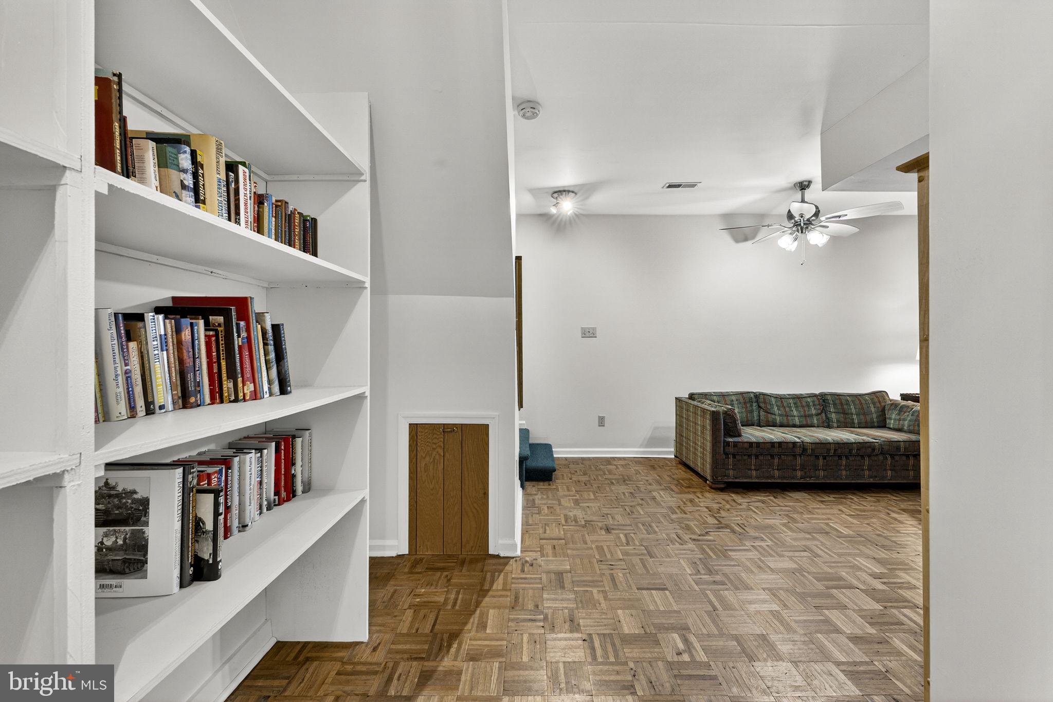 2266 Beaver Dam Road Midland, VA 22728 - Photo 78 of 93 a living room with furniture and a book shelf