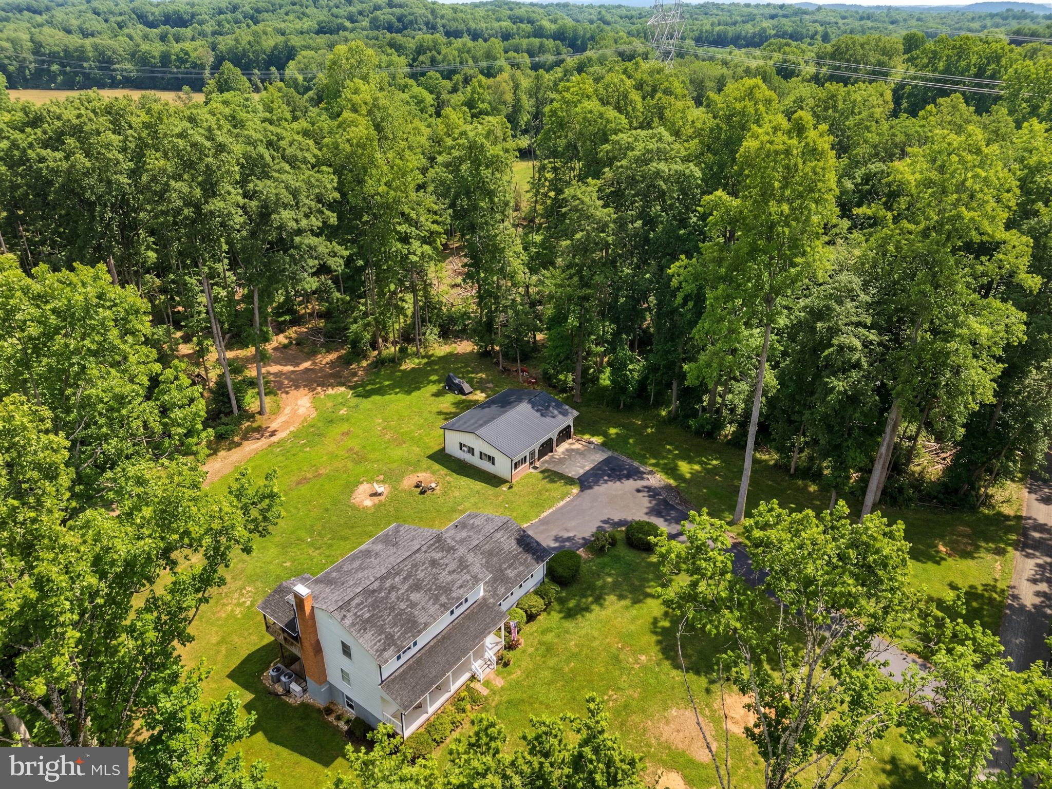 2266 Beaver Dam Road Midland, VA 22728 - Photo 91 of 93 a aerial view of a house with a yard basket ball court and outdoor seating