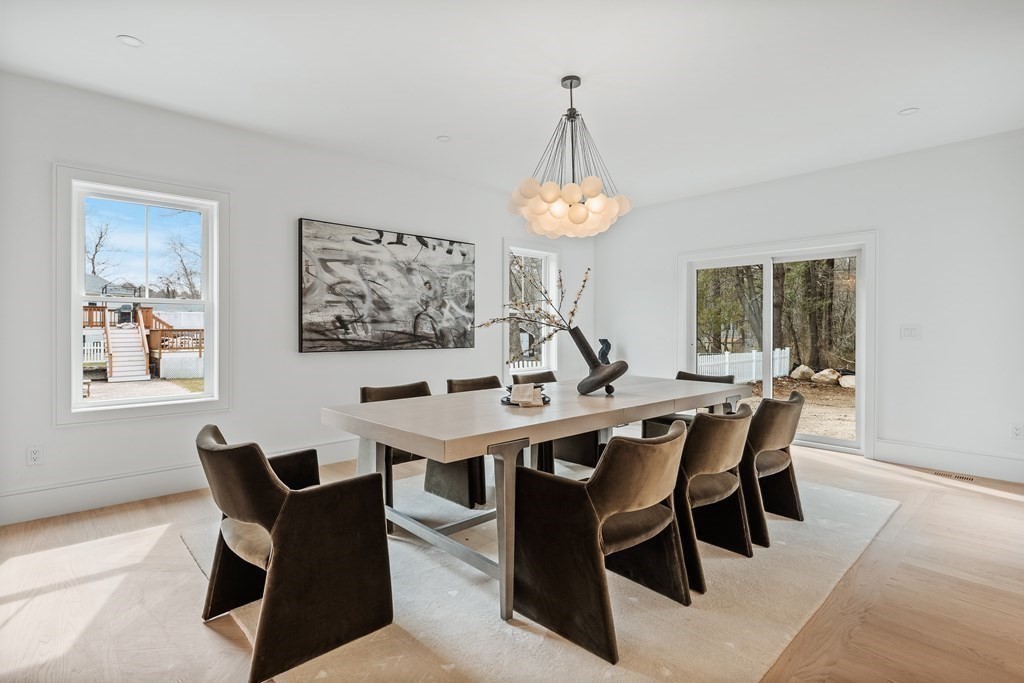 5 Brookside Lane Burlington, MA 01803 - Photo 14 of 40 a view of a dining room and a table and chairs