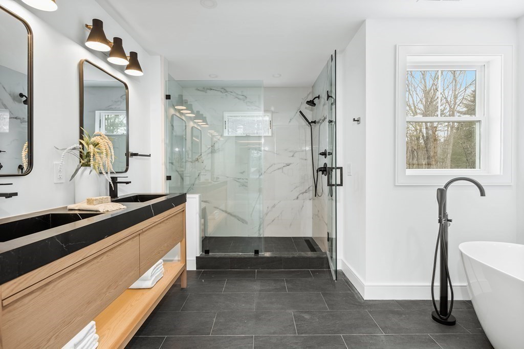 5 Brookside Lane Burlington, MA 01803 - Photo 23 of 40 a bathroom with a sink a toilet and shower