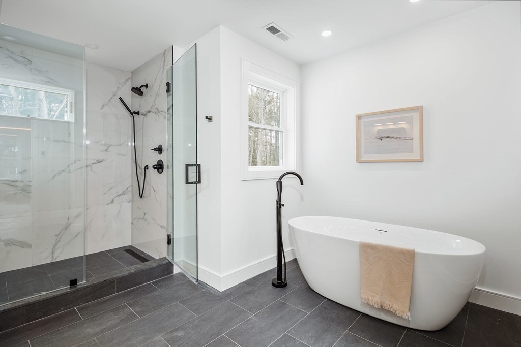 5 Brookside Lane Burlington, MA 01803 - Photo 24 of 40 a bathroom with a bathtub and shower