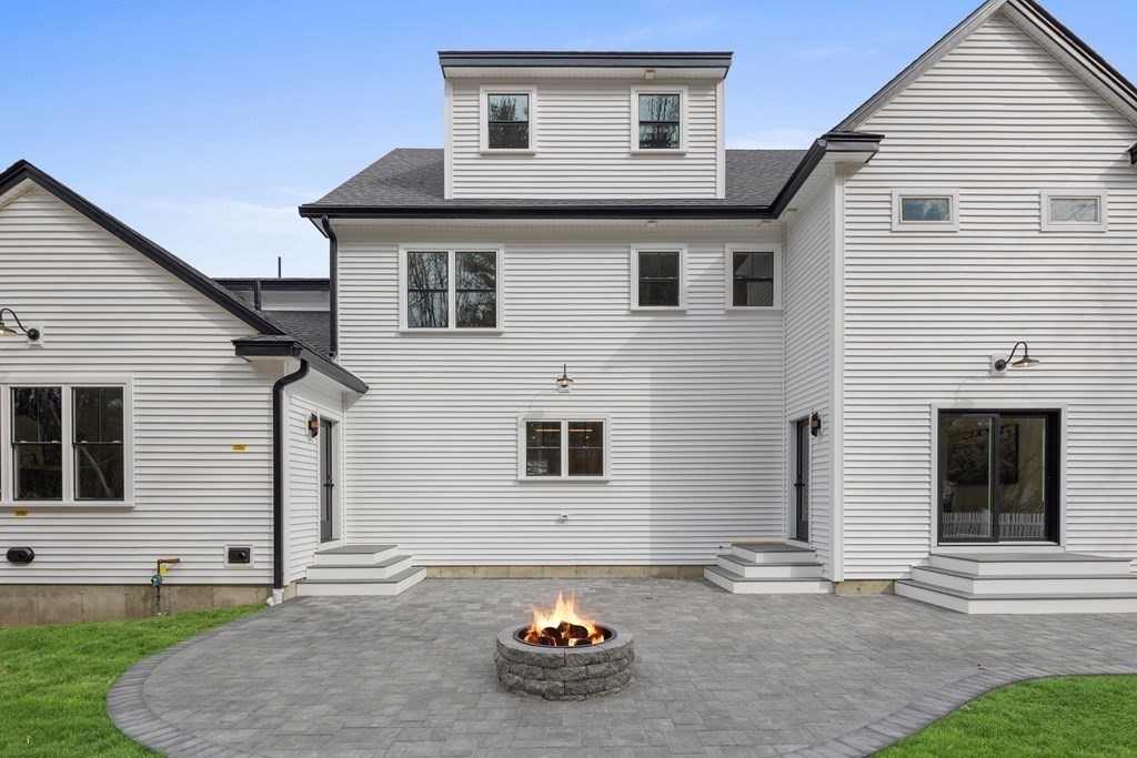 5 Brookside Lane Burlington, MA 01803 - Photo 38 of 40 a front view of a house with parking space