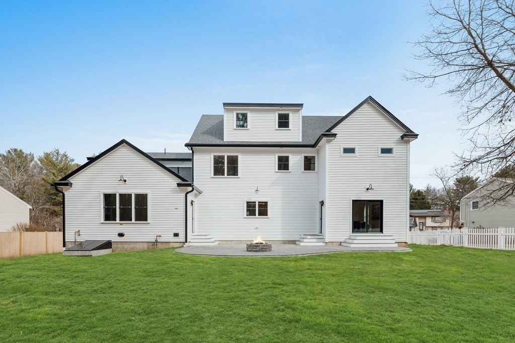 5 Brookside Lane Burlington, MA 01803 - Photo 39 of 40 a front view of a house with a garden