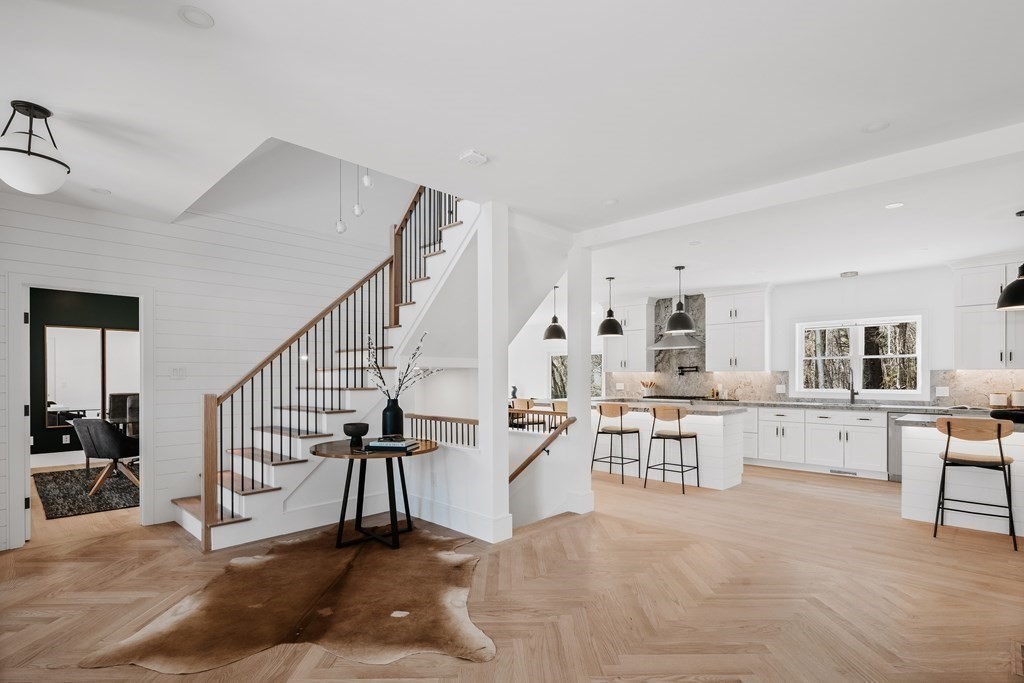 5 Brookside Lane Burlington, MA 01803 - Photo 4 of 40 a view of a kitchen with furniture and staircase