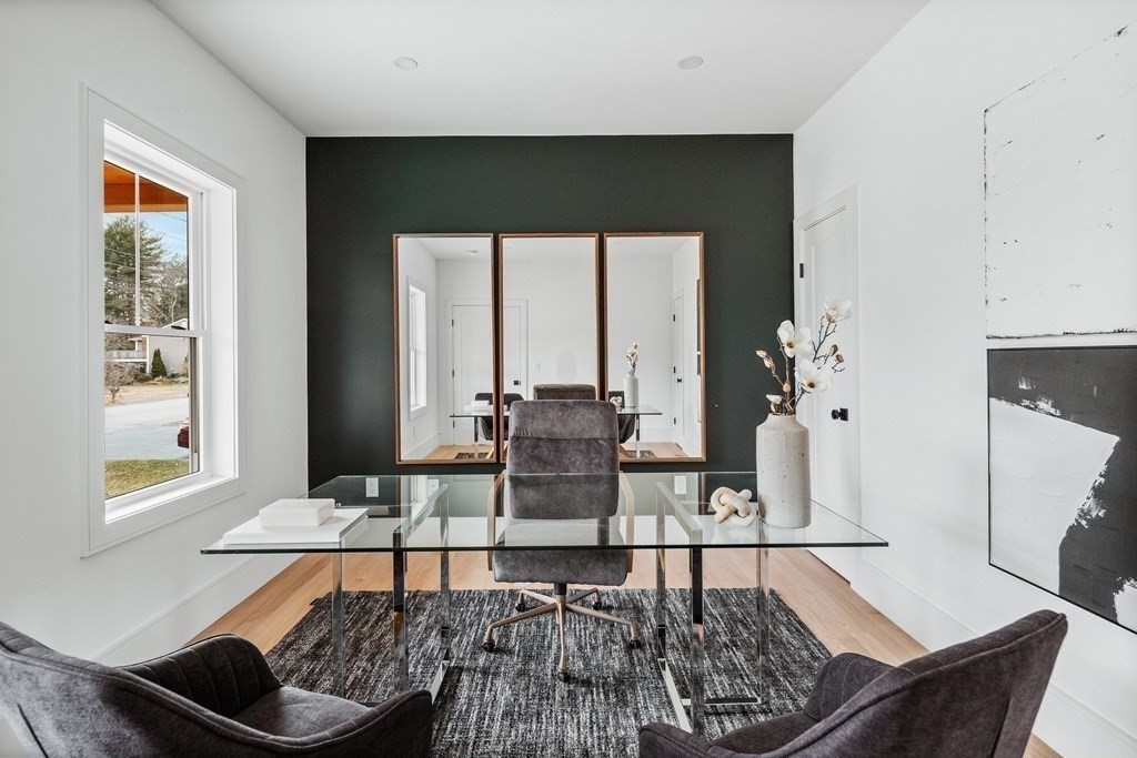 5 Brookside Lane Burlington, MA 01803 - Photo 6 of 40 a living room with furniture and a window