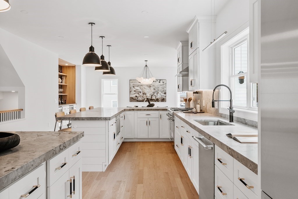 5 Brookside Lane Burlington, MA 01803 - Photo 9 of 40 a large kitchen with a sink and cabinets