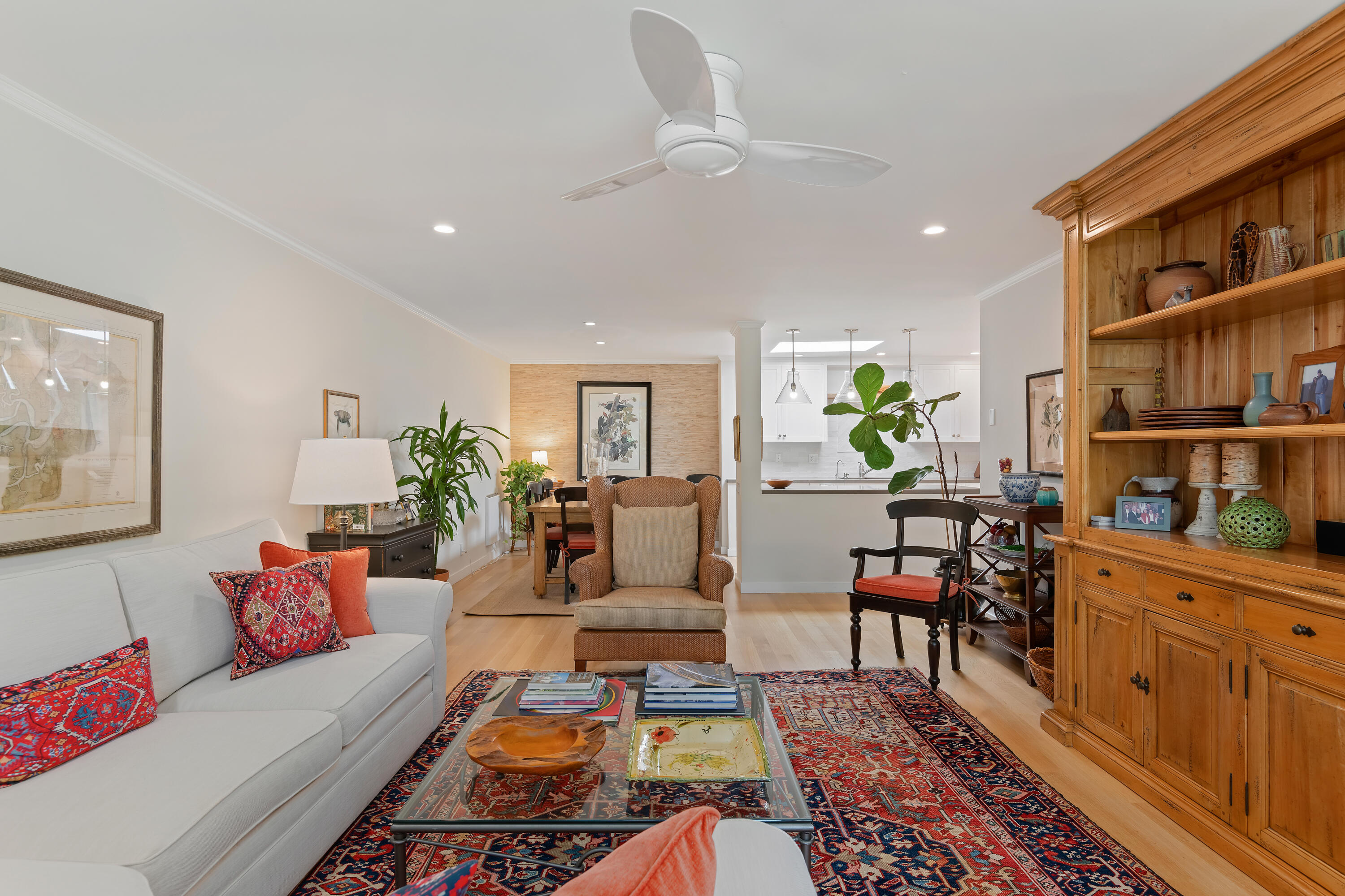 1220 Coast Village Road, Unit 303 Santa Barbara, CA 93108 - Photo 11 of 29 a living room with furniture and a book shelf