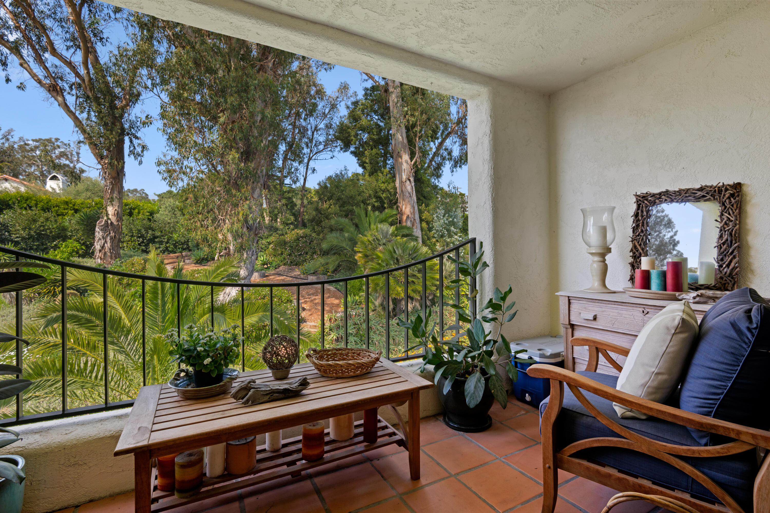 1220 Coast Village Road, Unit 303 Santa Barbara, CA 93108 - Photo 15 of 29 a living room with furniture and a potted plant
