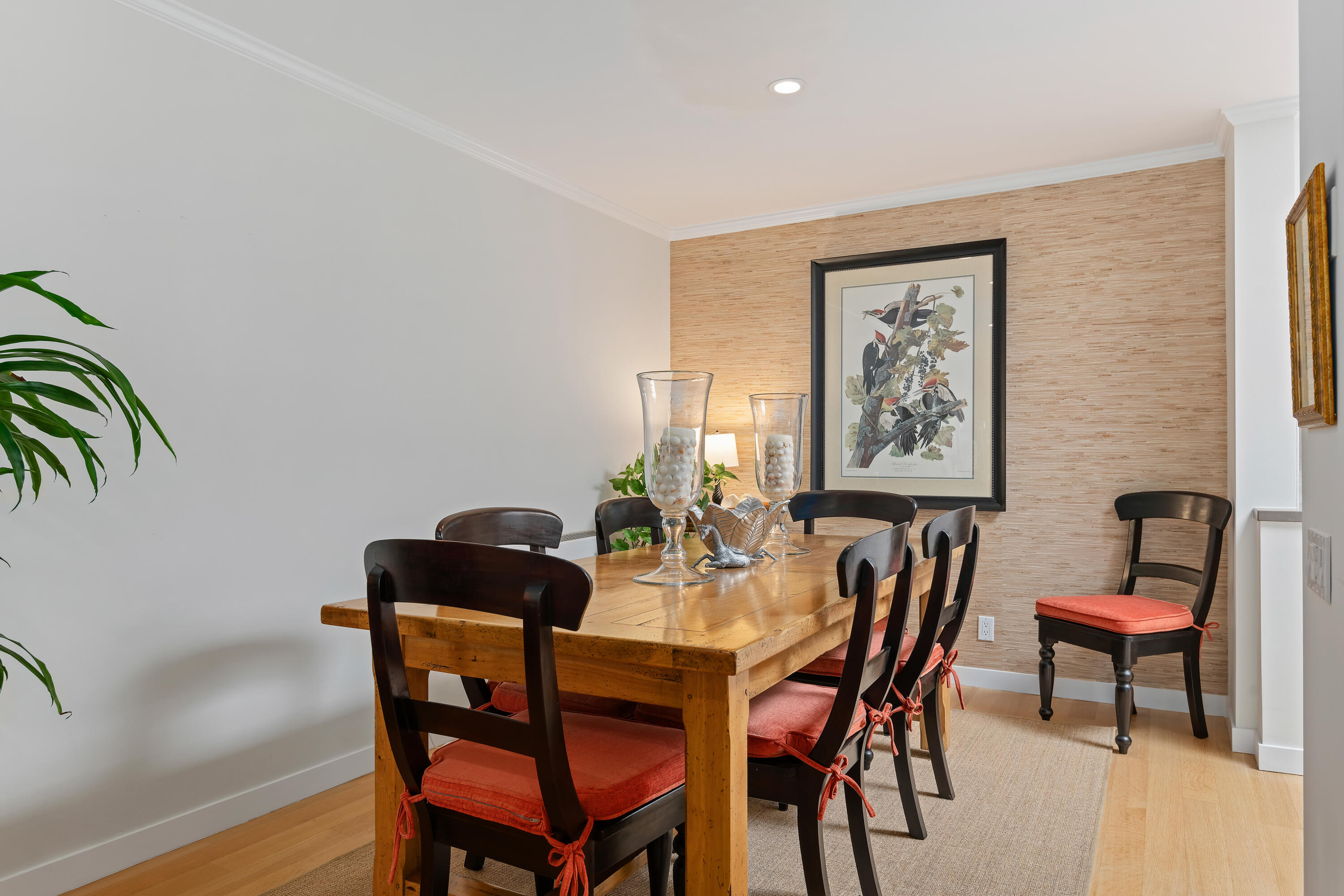 1220 Coast Village Road, Unit 303 Santa Barbara, CA 93108 - Photo 16 of 29 a view of a dining room with furniture and wooden floor