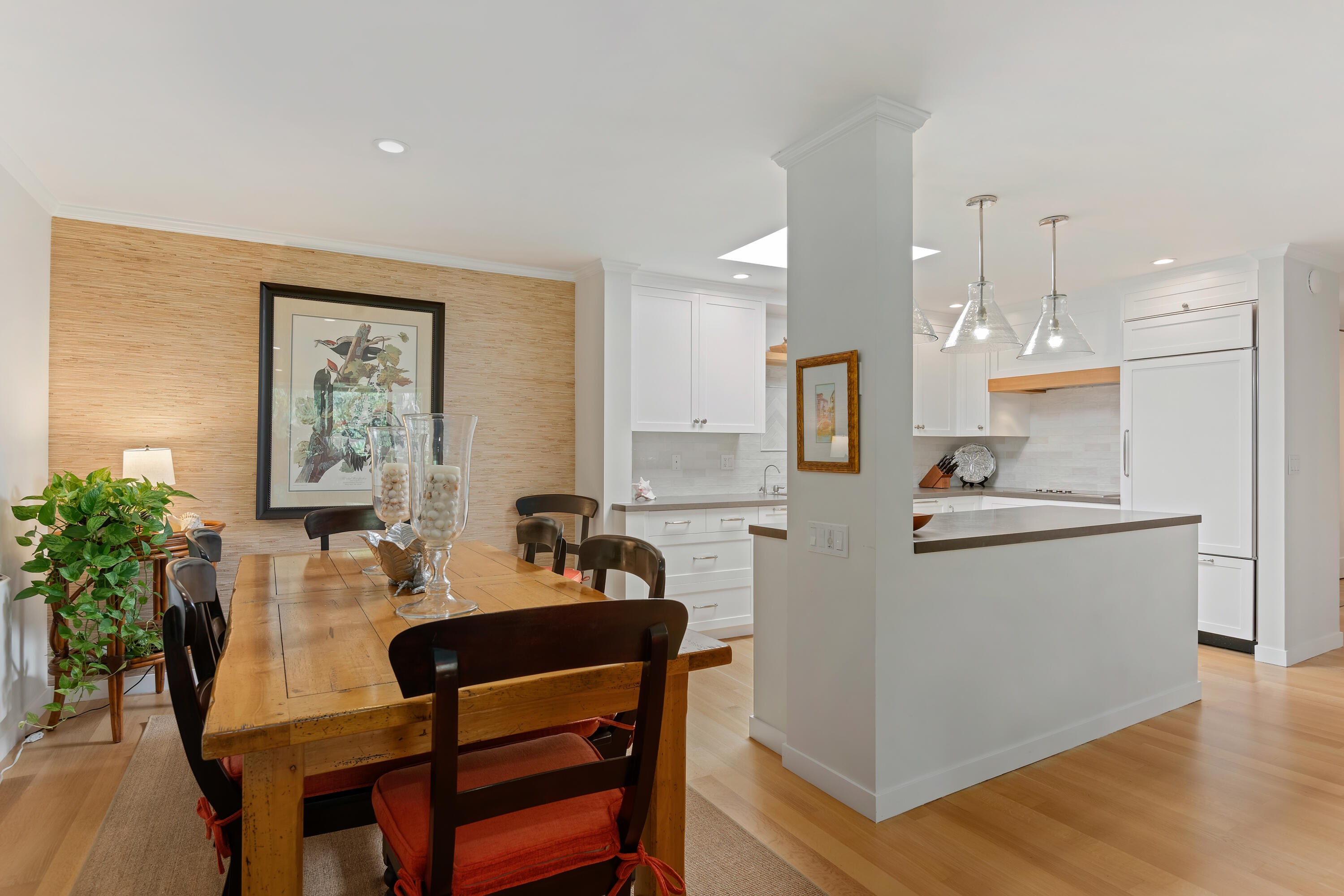 1220 Coast Village Road, Unit 303 Santa Barbara, CA 93108 - Photo 17 of 29 a view of a dining room with furniture and wooden floor