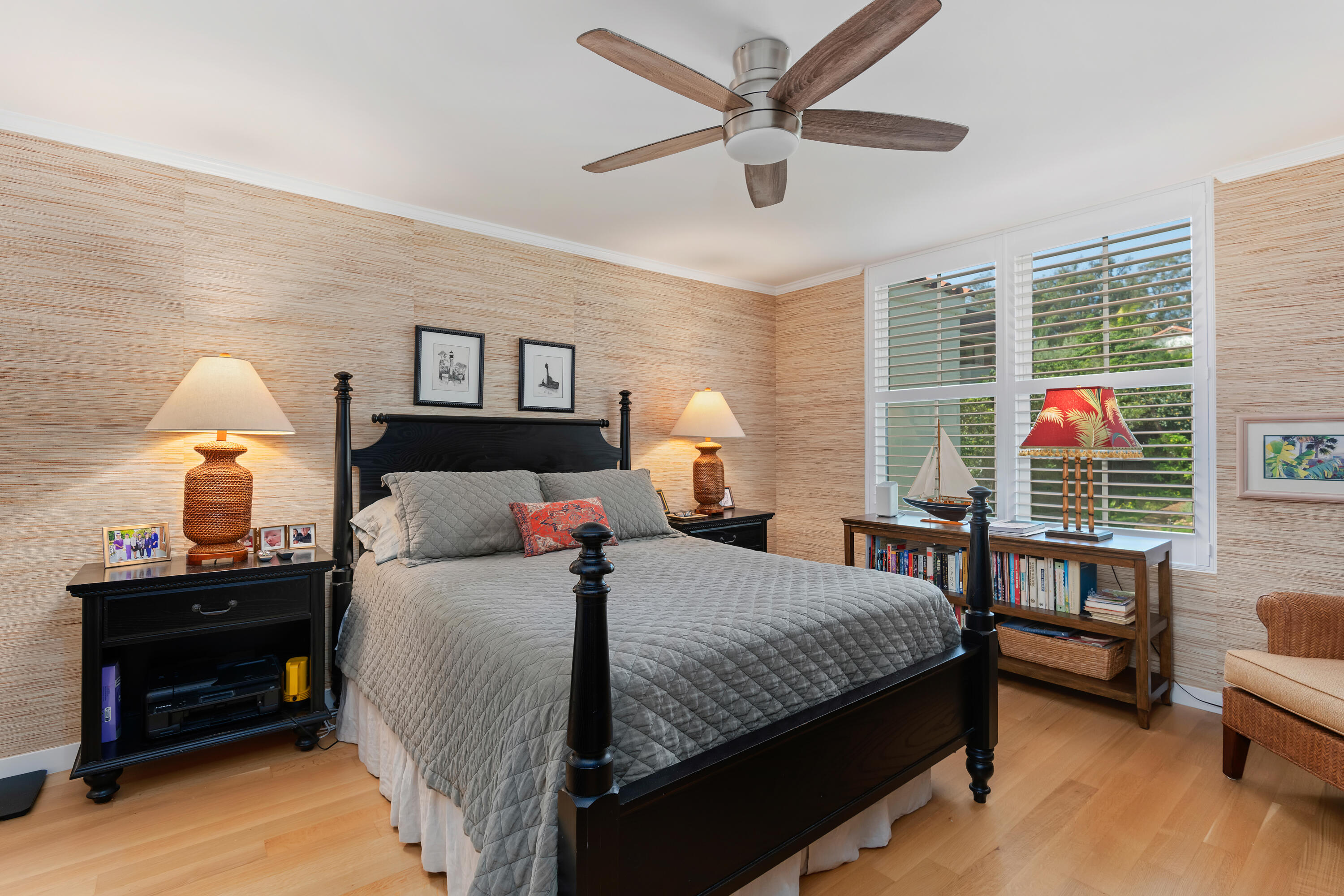 1220 Coast Village Road, Unit 303 Santa Barbara, CA 93108 - Photo 18 of 29 a bedroom with a bed and a chandelier