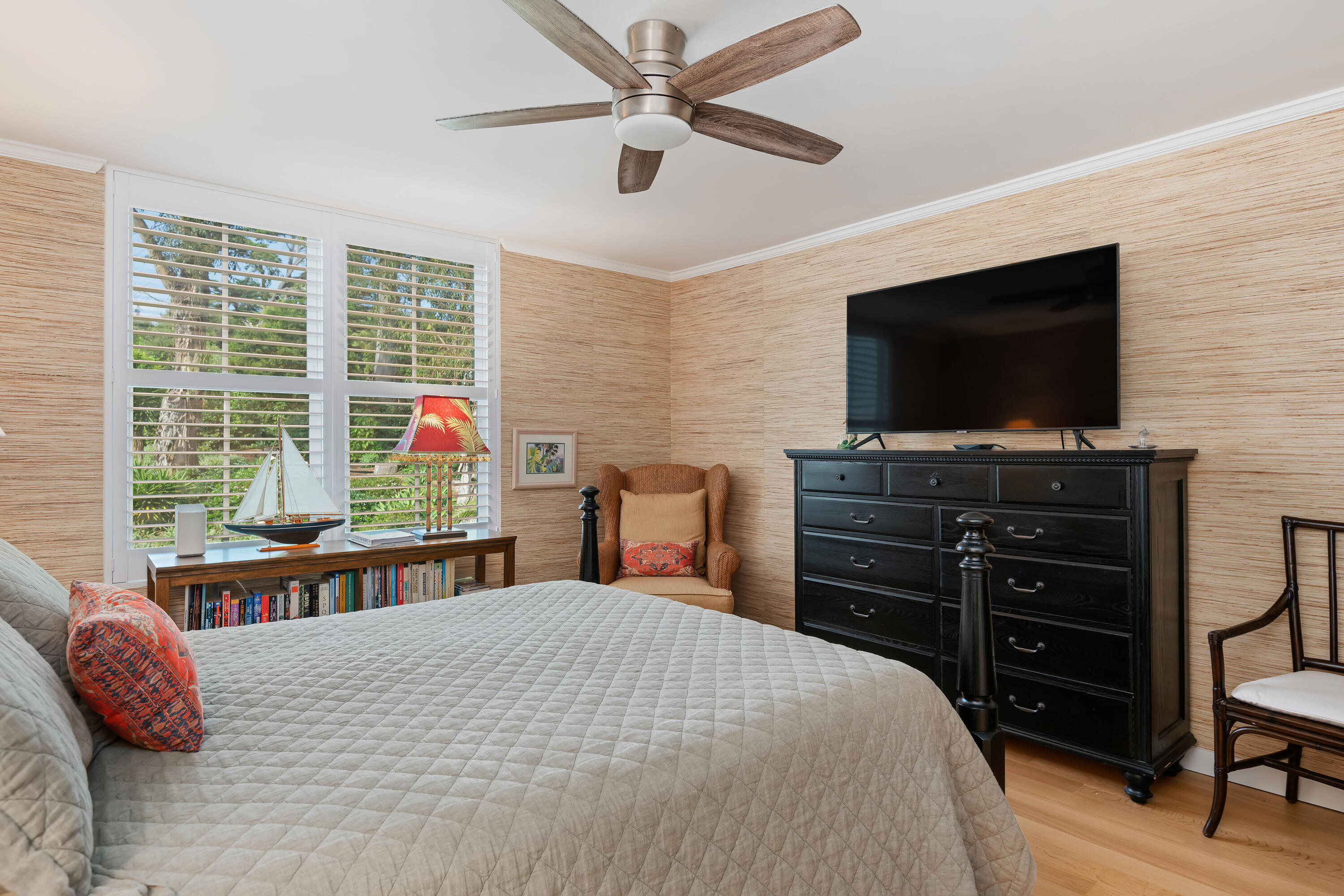 1220 Coast Village Road, Unit 303 Santa Barbara, CA 93108 - Photo 19 of 29 a bedroom with a bed and a flat screen tv